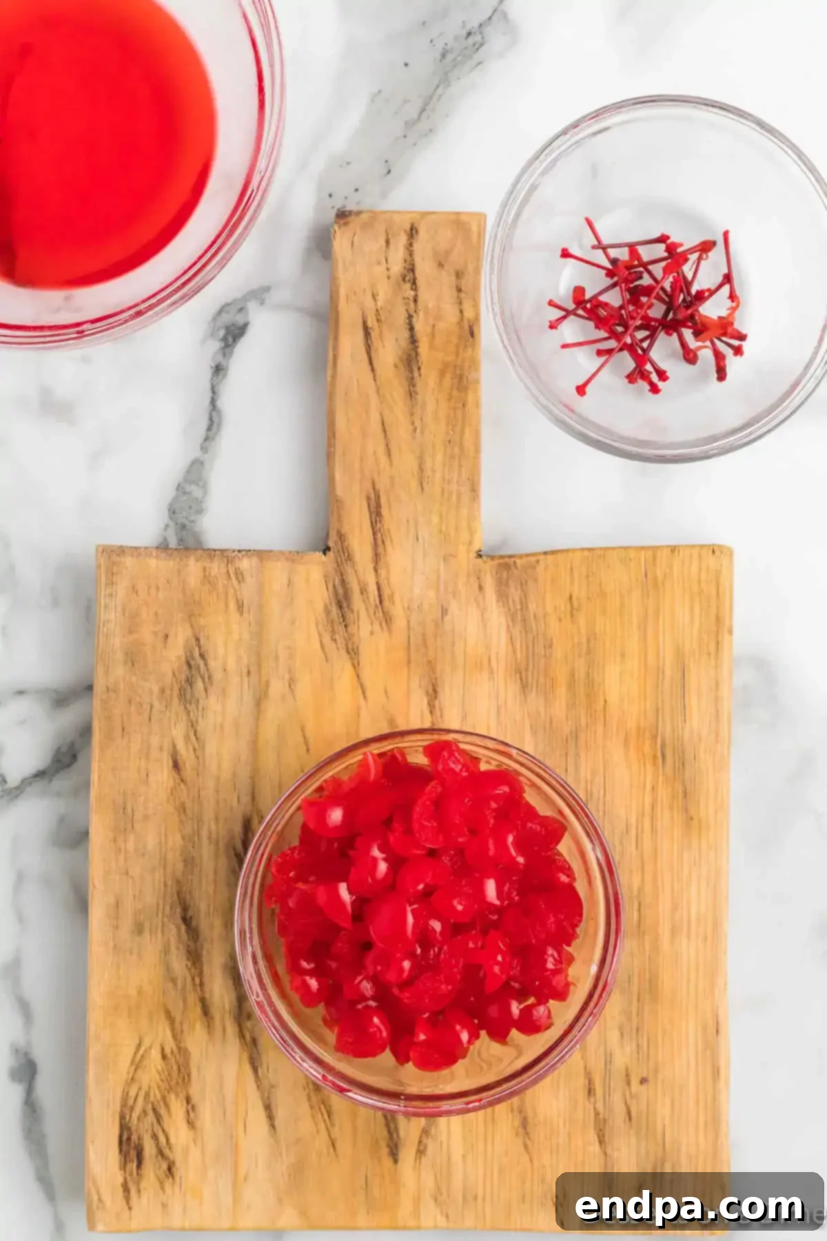 Chopped maraschino cherries in a small bowl, ready for preparation.