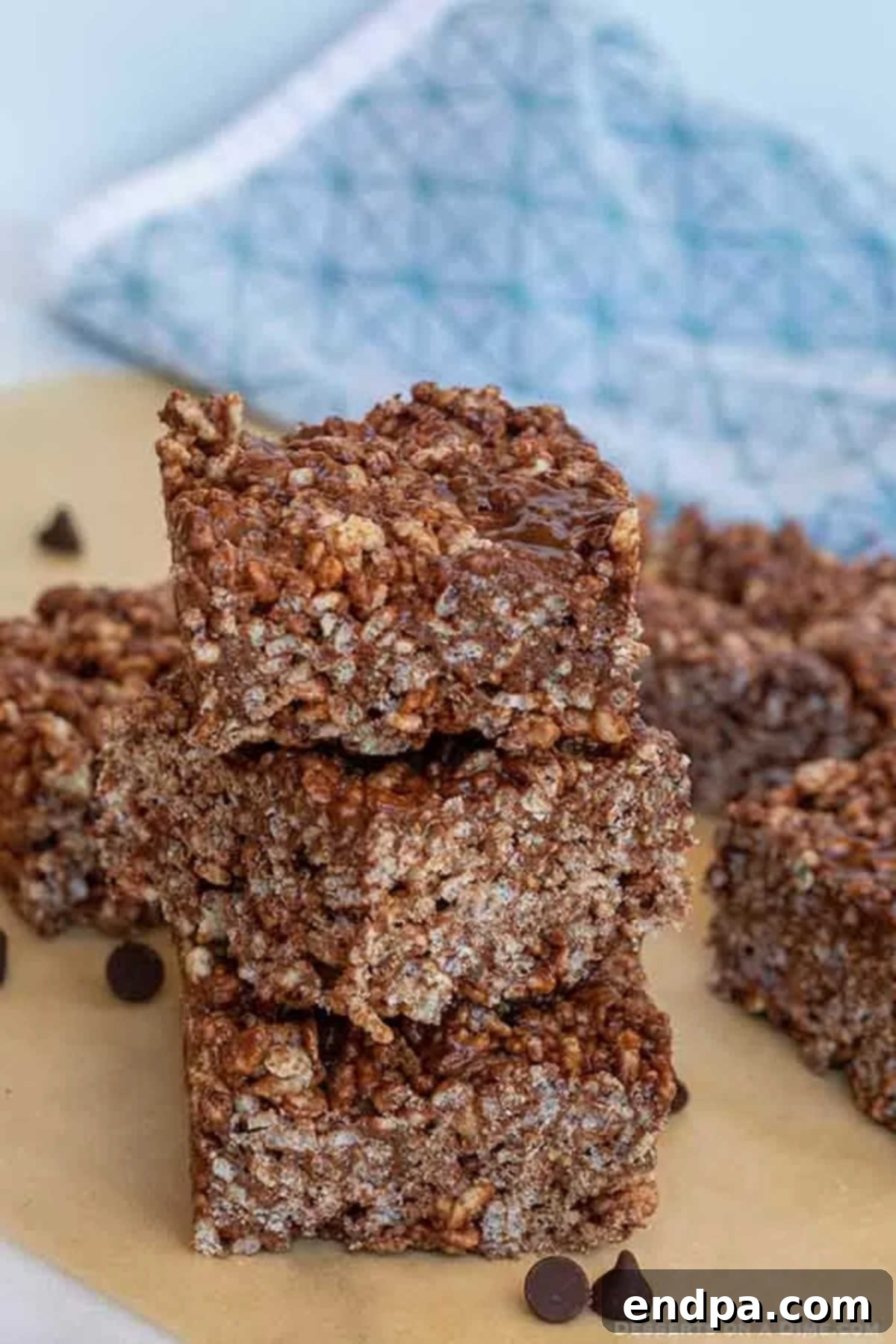 A stack of rich Chocolate Rice Krispie Treats, showcasing their tempting texture.