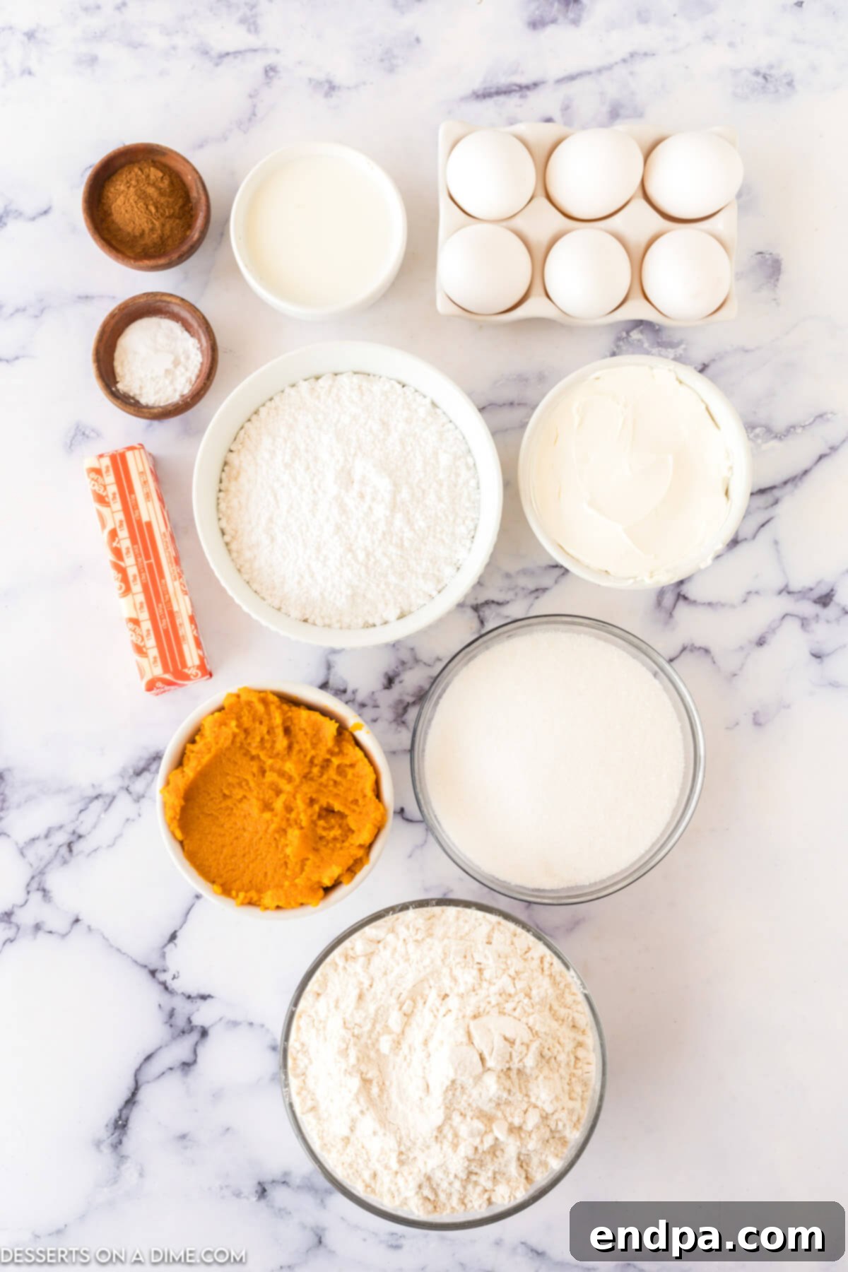 Ingredients for Pumpkin Bundt Cake - softened butter, eggs, pumpkin puree, baking soda, all-purpose flour, powdered sugar, block cream cheese, pumpkin pie spice, milk, granulated sugar.