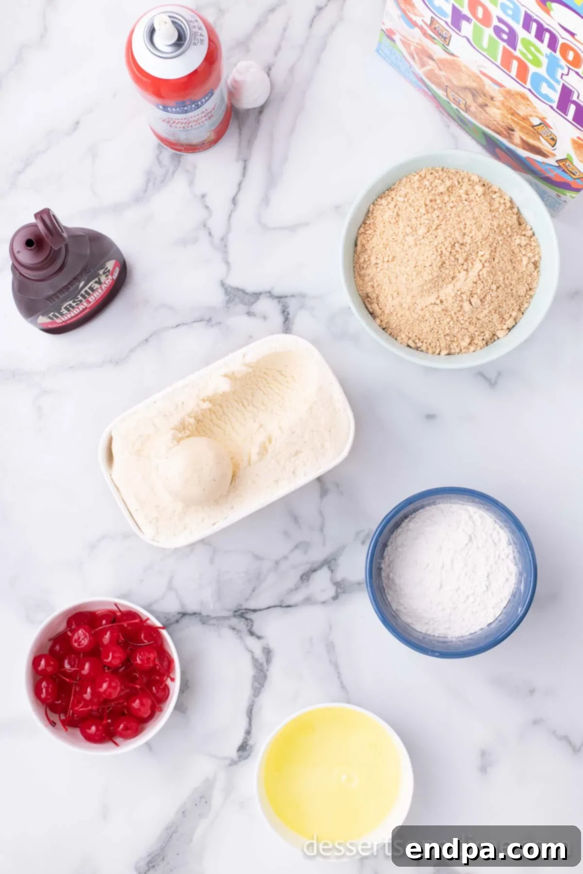 Ingredients for air fryer fried ice cream laid out: vanilla ice cream, flour, egg whites, Cinnamon Toast Crunch cereal, and various toppings.