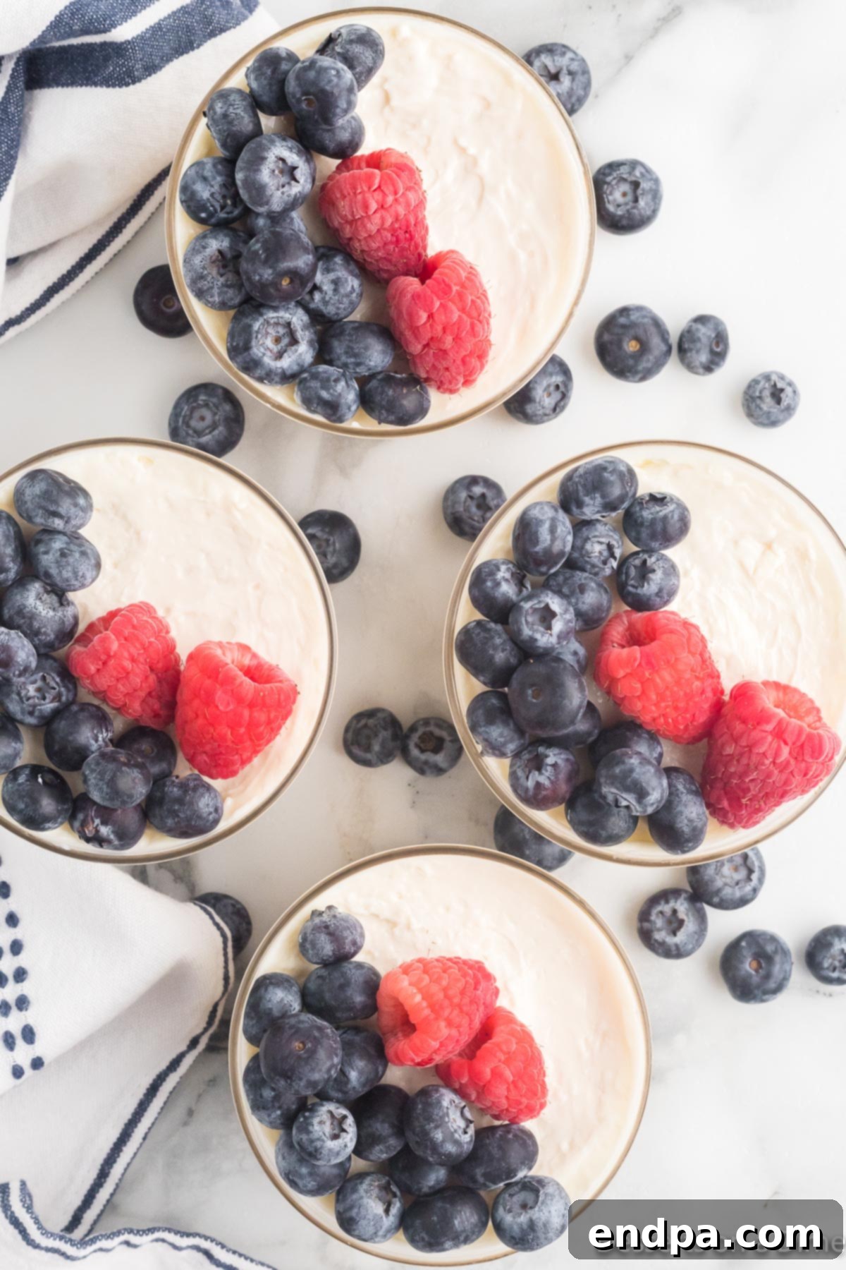 Fresh berries on top of each bowl.
