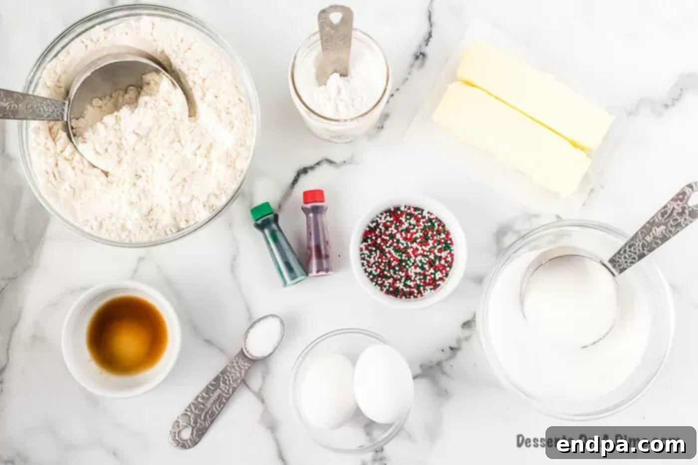 Ingredients needed - flour, salt, baking powder, butter, sugar, eggs, vanilla, red food coloring, green food coloring, christmas sprinkles