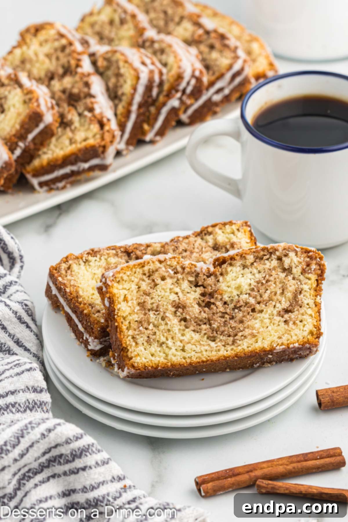 Slices of bread on a plate beside a cup of coffee. 