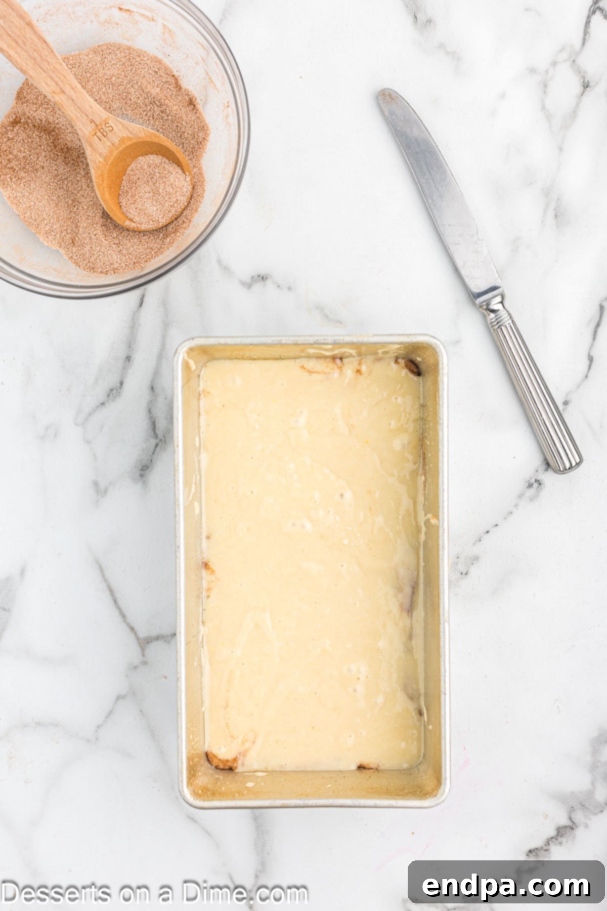 Loaf pan with batter. 