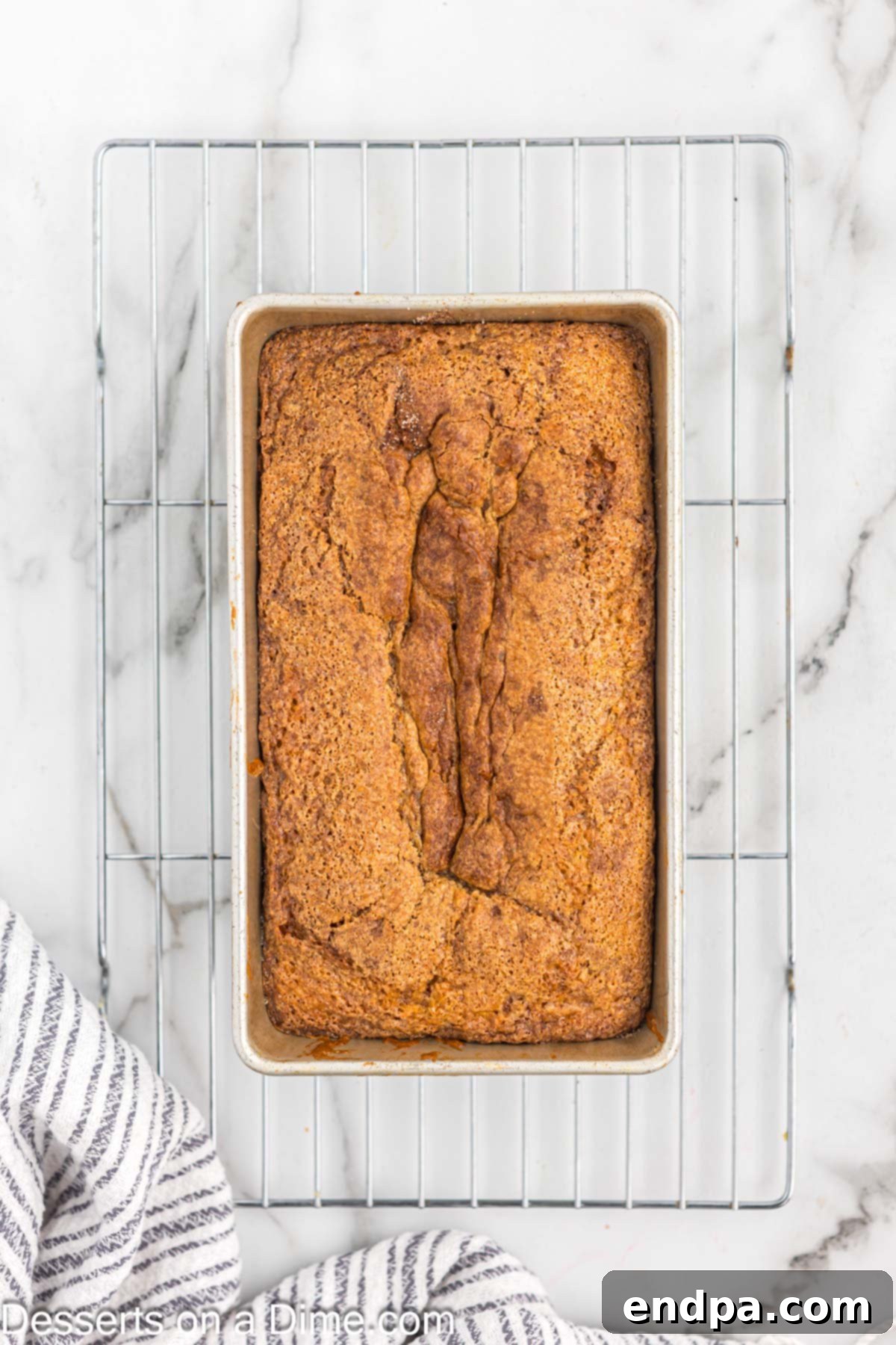 Bread baked and on a cooling rack. 