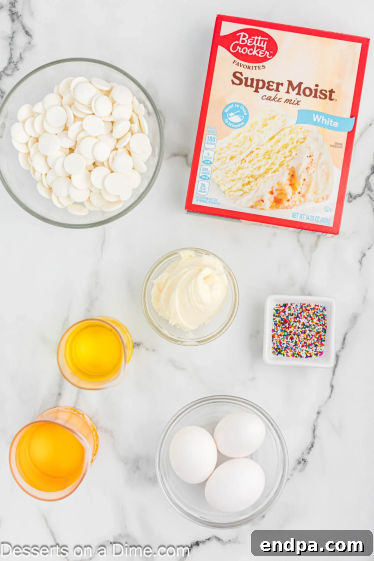 Whip Up Perfect Cake Pops 3 Ingredients for making homemade cake pops, including cake mix, candy melts, sprinkles, frosting, eggs, and oil.