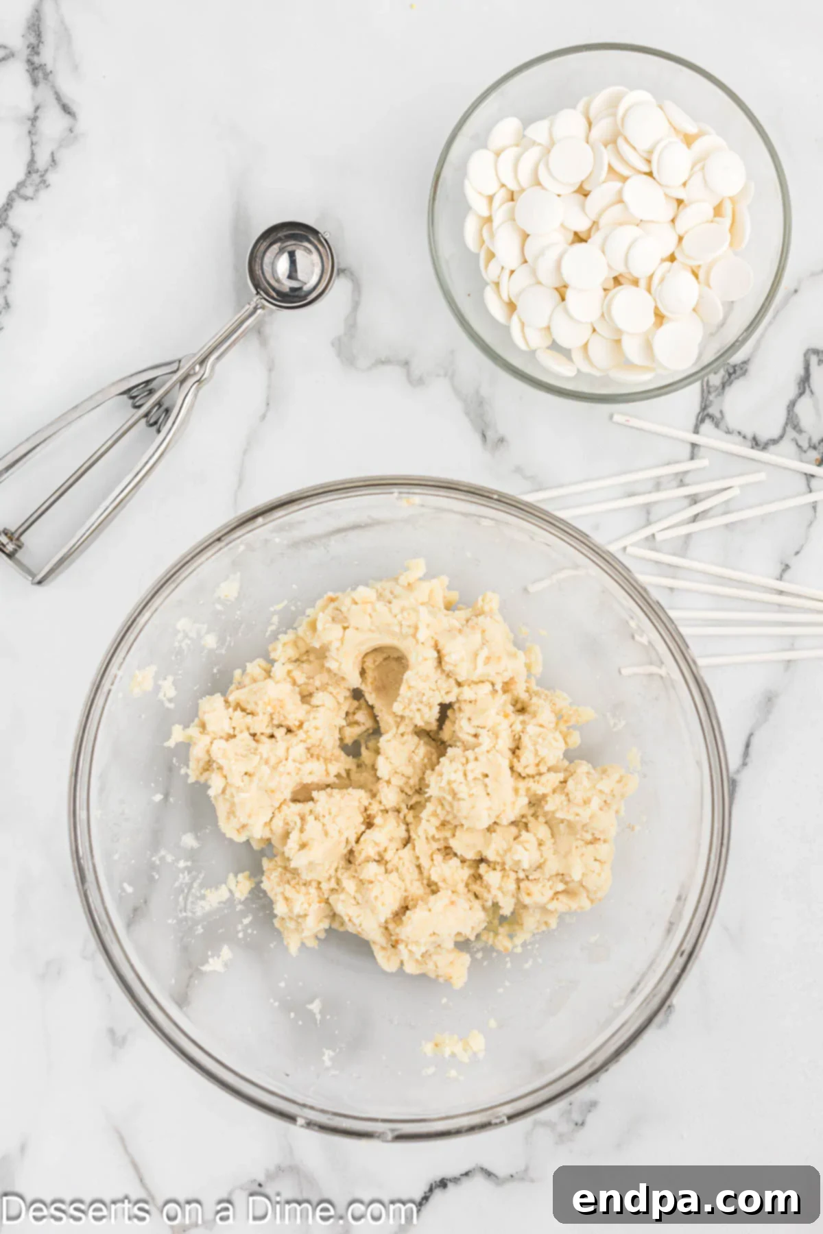 Whip Up Perfect Cake Pops 5 Crumbled cake mixed with frosting in a large mixing bowl, forming the cake pop base.