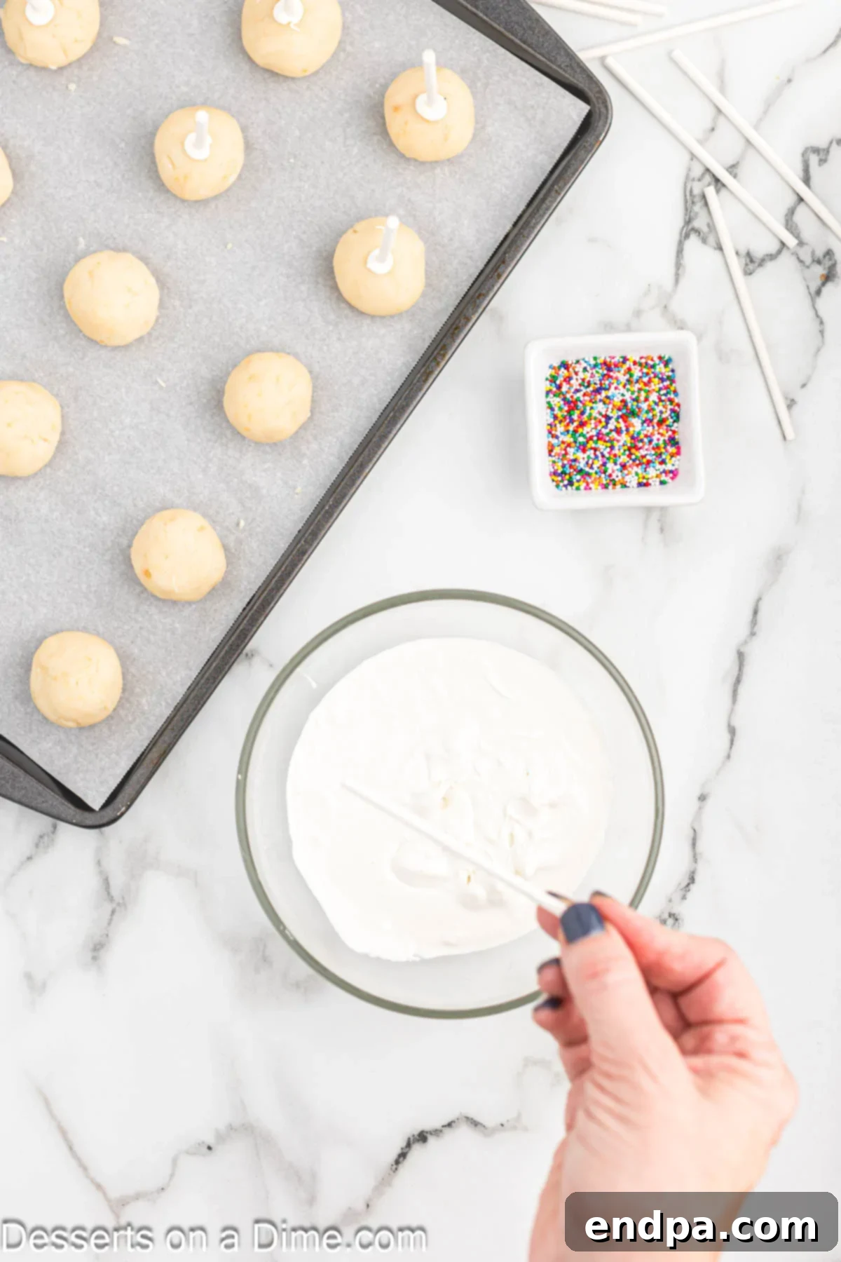 Whip Up Perfect Cake Pops 7 Lollipop stick dipped in melted candy and inserted into a cake ball.
