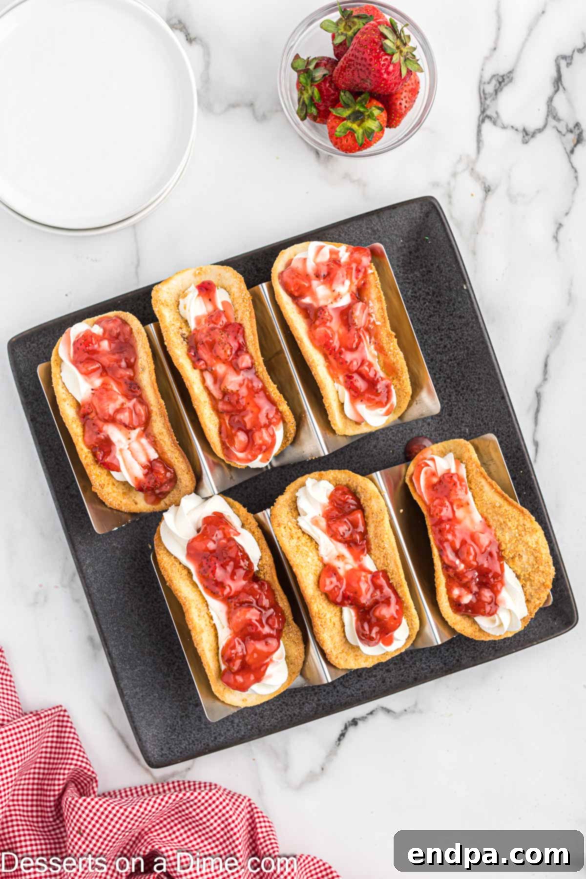 Strawberry topping on tacos.