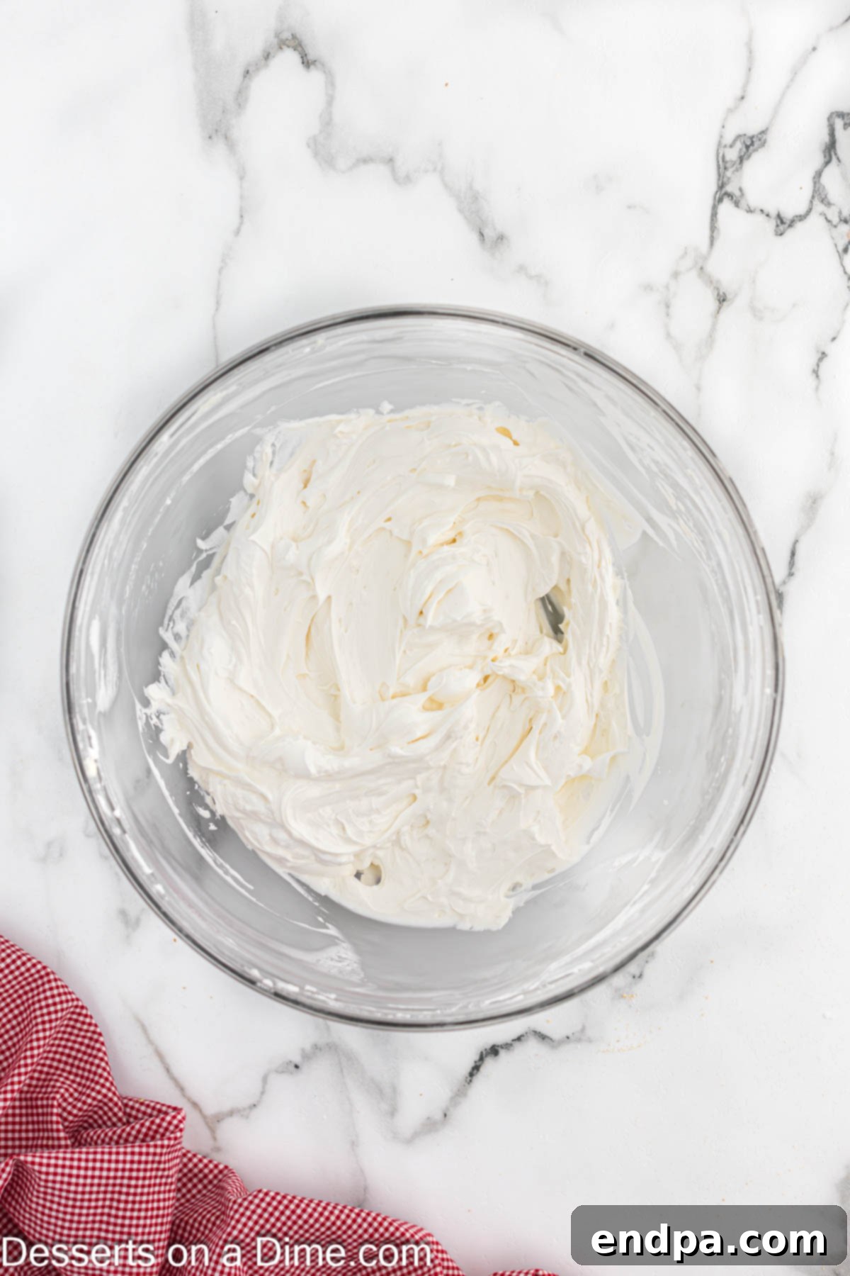 Whipped cream folded into filling.