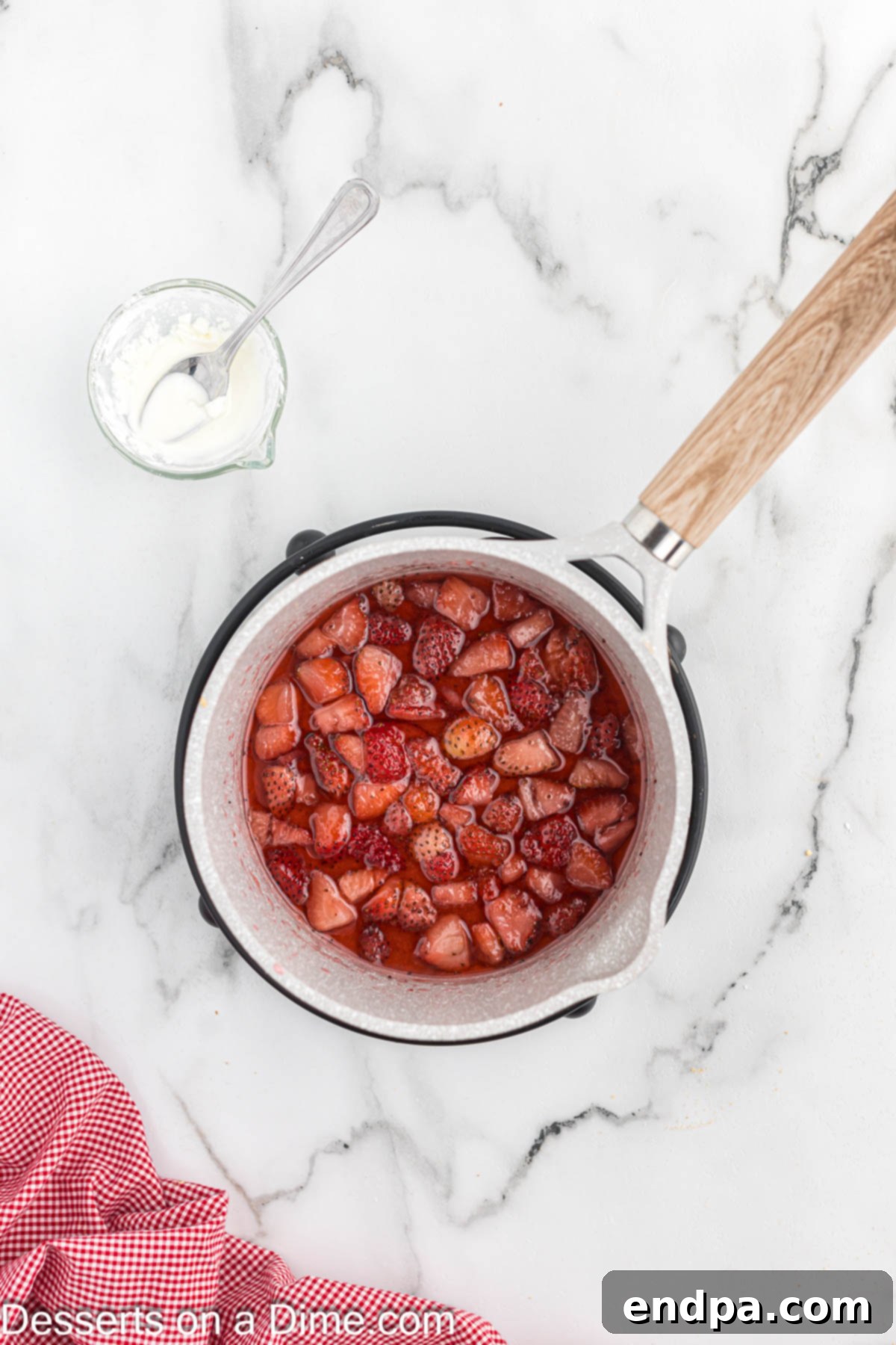 Strawberries in saucepan.