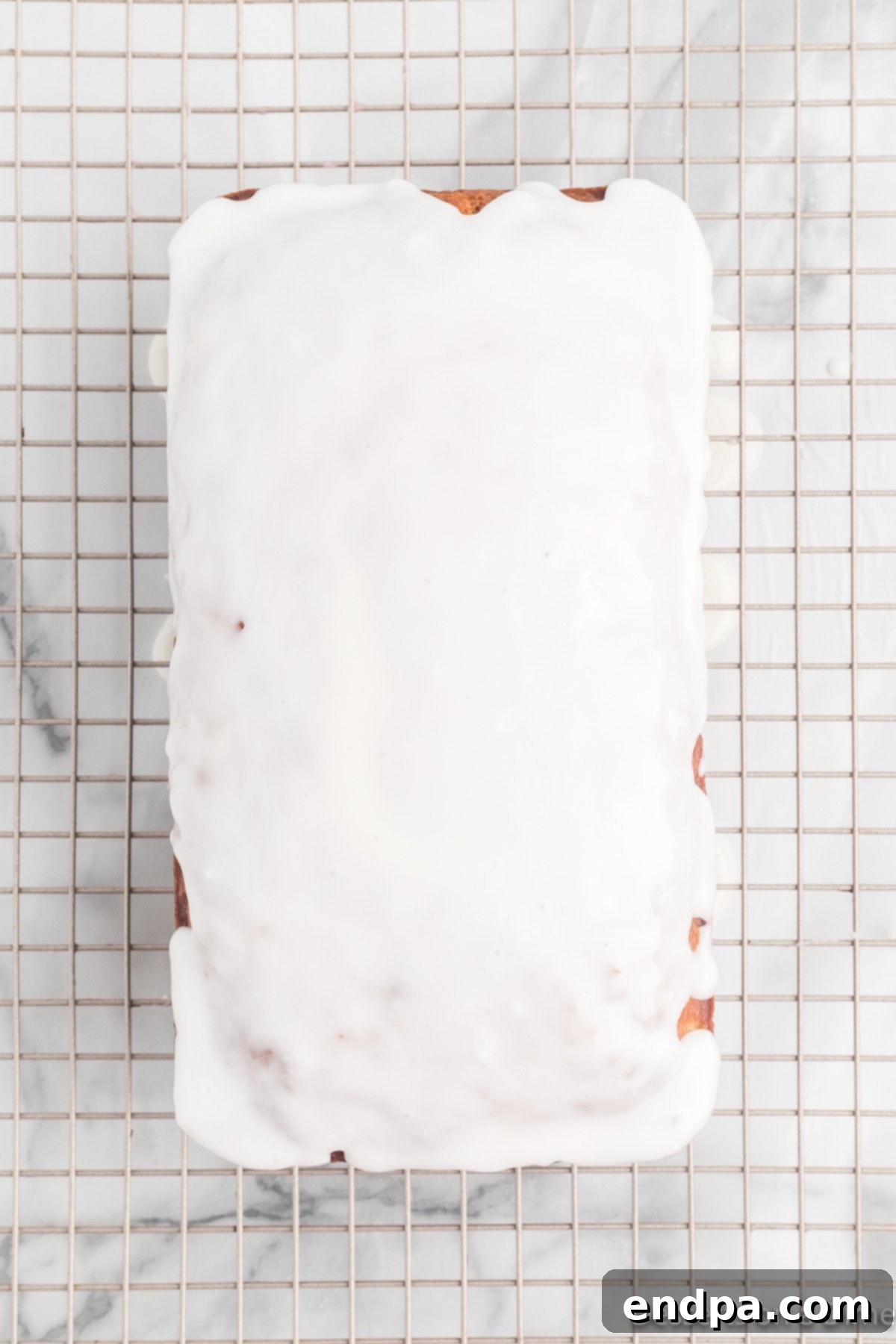 Grilled Pineapple Sweetbread 14 Glaze poured over bread.