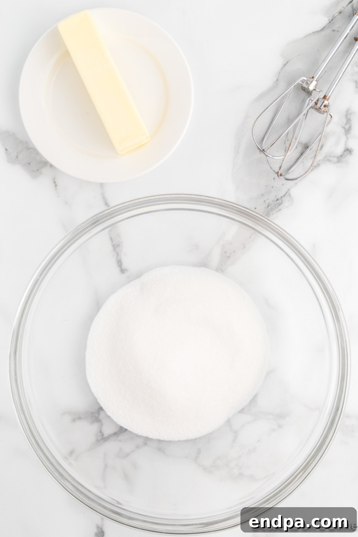 Grilled Pineapple Sweetbread 6 Bowl with sugar and butter being combined.