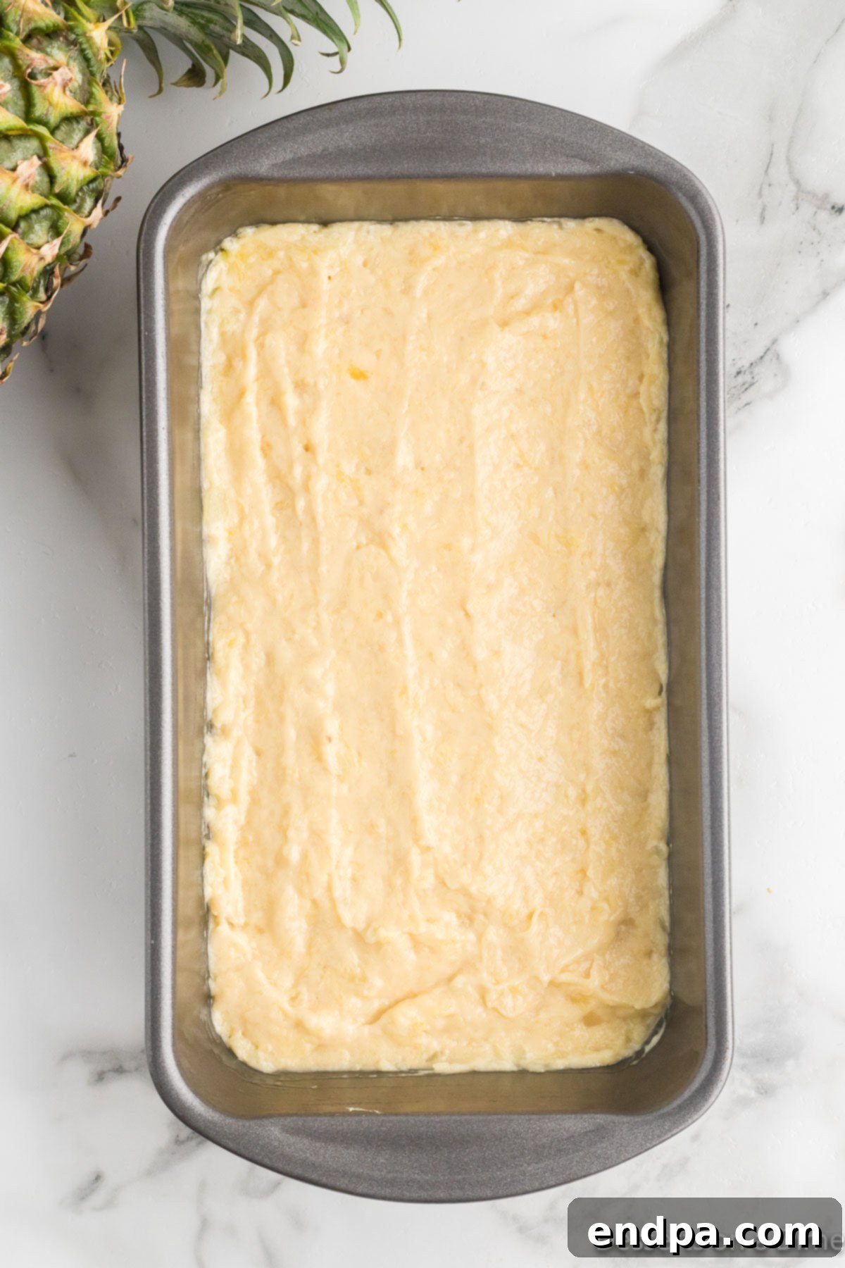 Grilled Pineapple Sweetbread 10 Batter poured into pan.