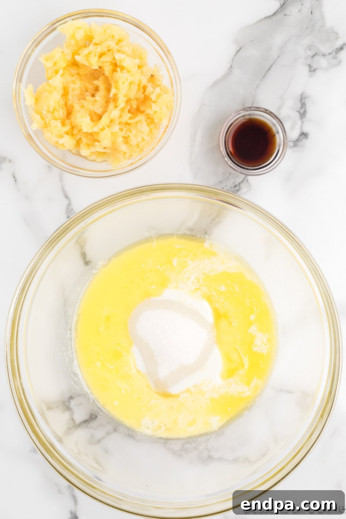 Tropical Pineapple Bread Pudding 5 Milk and pineapple added to bowl.