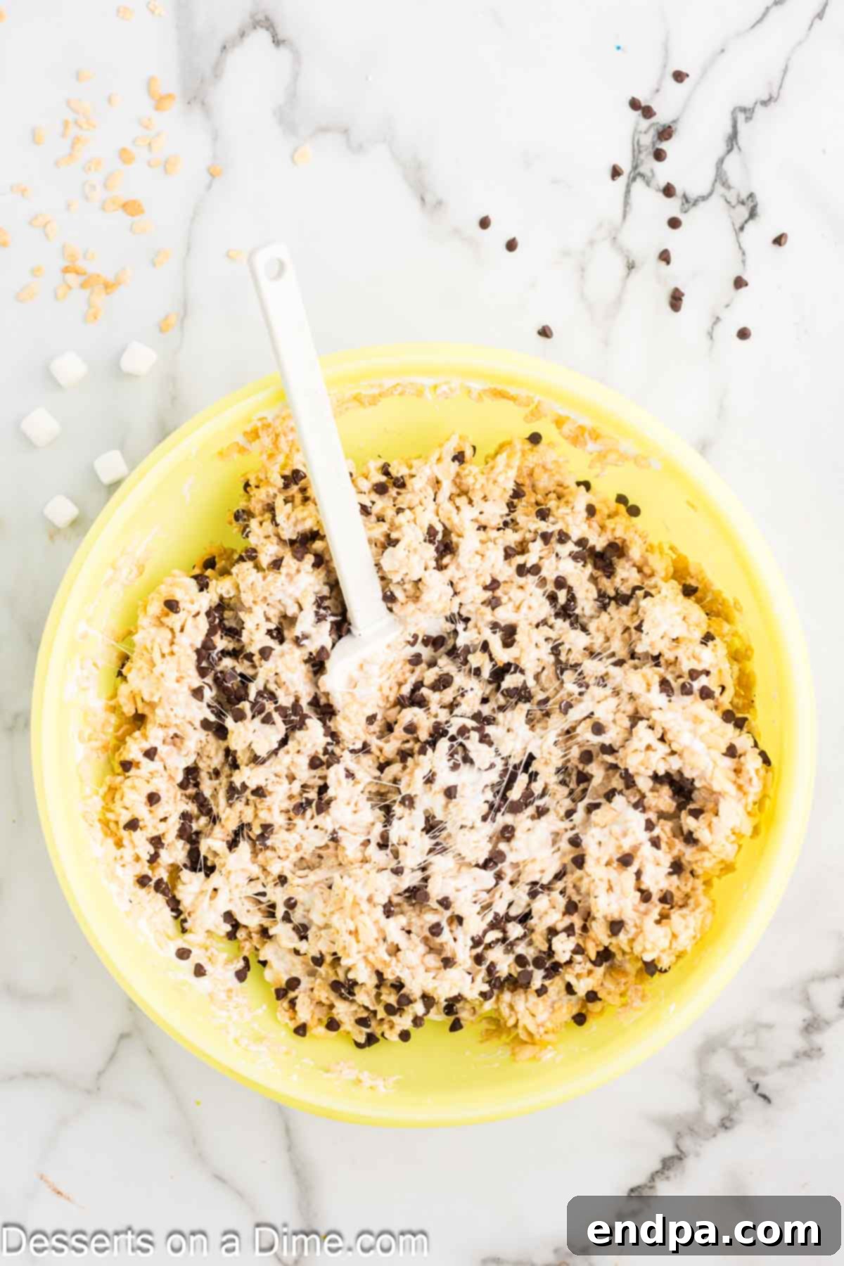 Chocolate chips folded into mixture. 