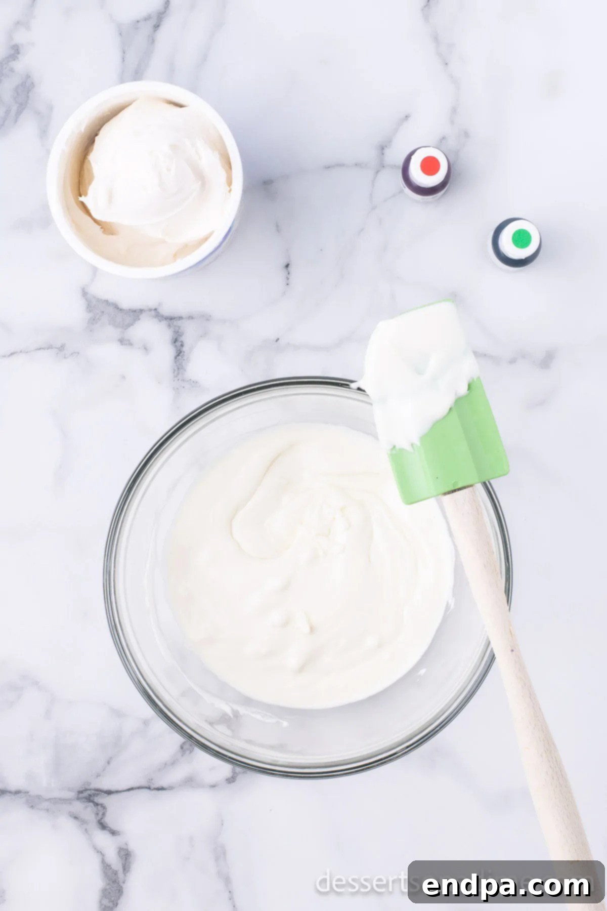 Microwave-safe bowl filled with white chocolate chips, ready for melting.