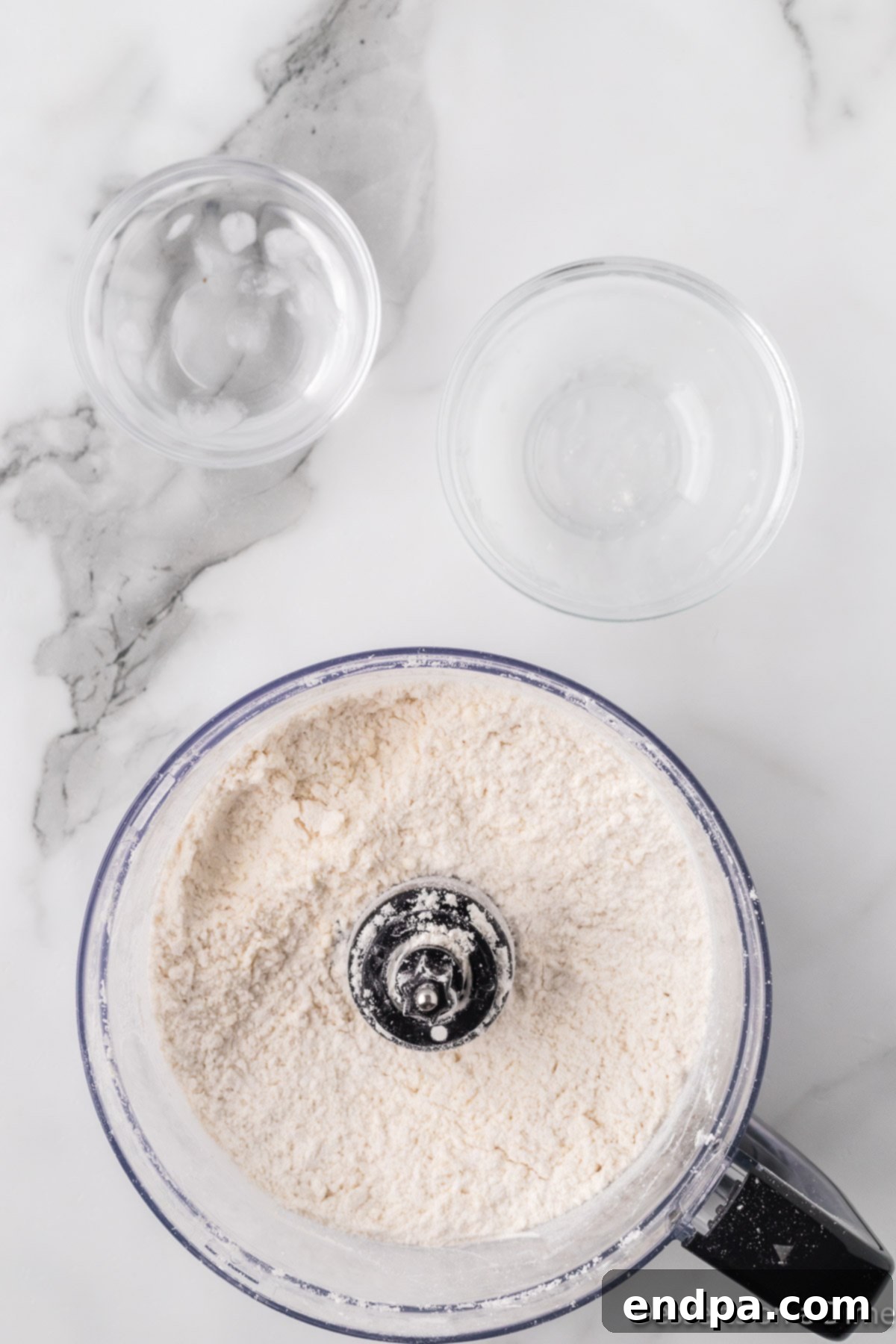 Crust ingredients in a food processor.