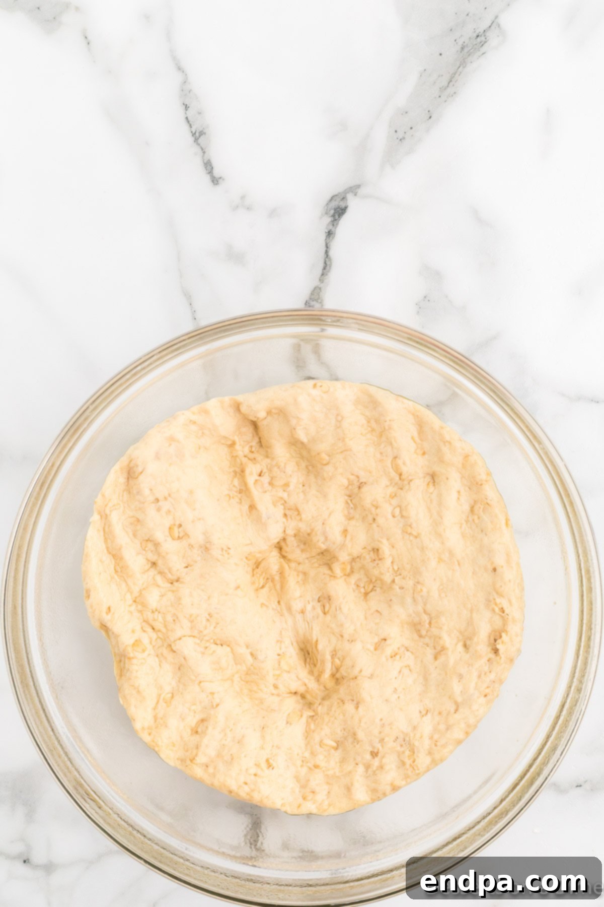 Dough after rising, being punched down.