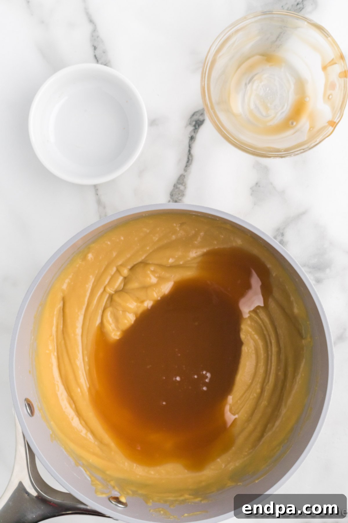 Caramel in pan mixed together.