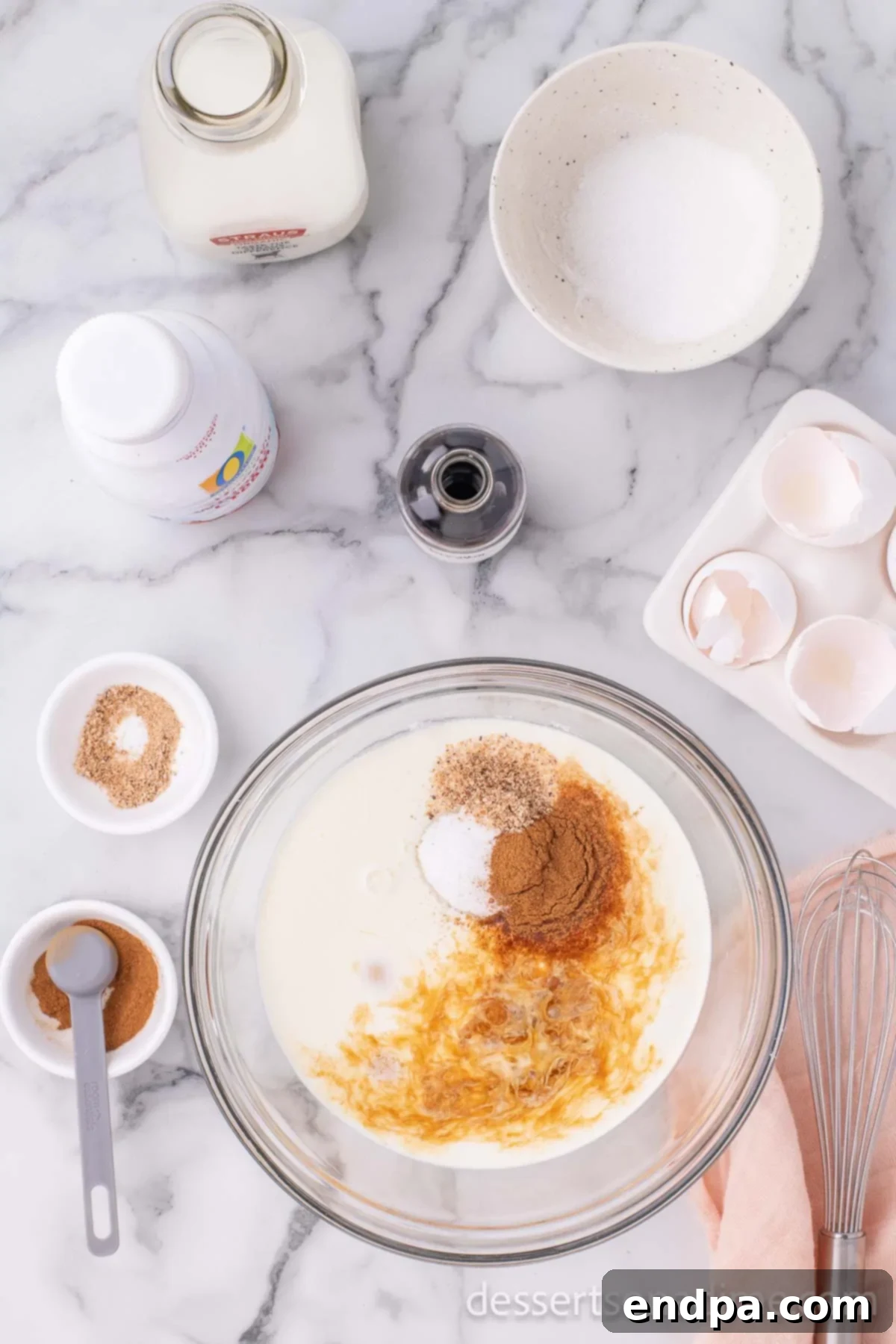 Summer Peach Bread Delight 6 A large mixing bowl containing a whisked egg mixture, a rich custard ready for the bread.