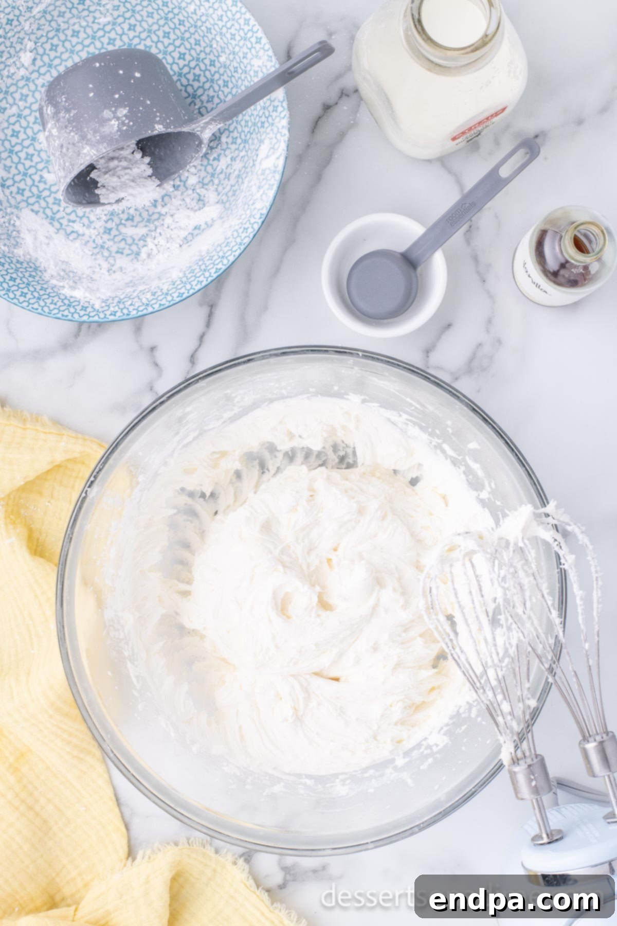 Luscious Lemon Blackberry Cake 11 Finished lemon buttercream frosting, creamy and fluffy, with lemon juice, milk, and vanilla extract incorporated.