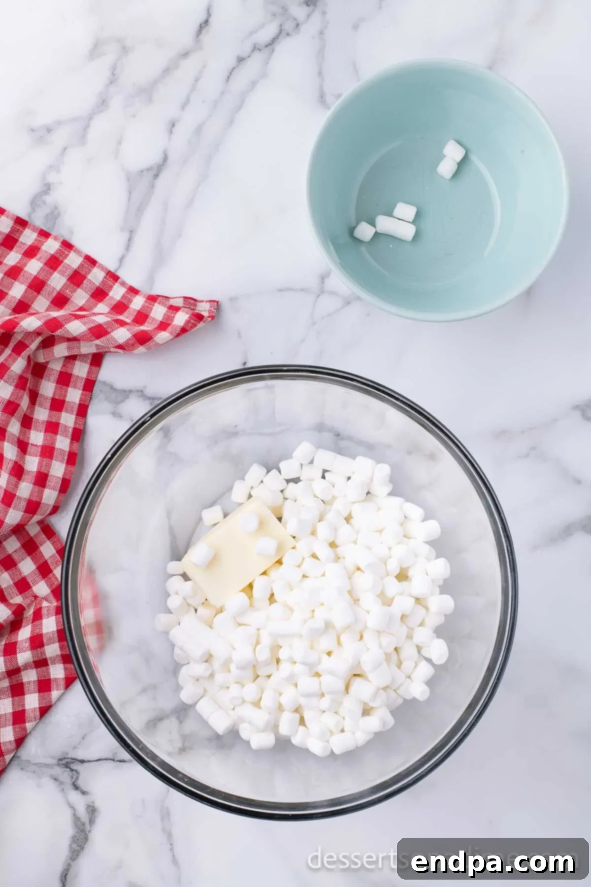 Marshmallows and butter in a bowl. 