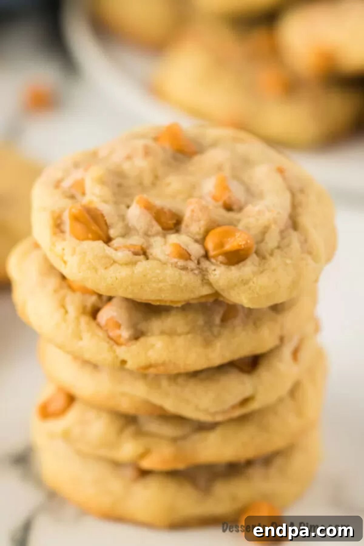 Delicious homemade butterscotch cookies, stacked and ready to eat. A stack of perfectly baked butterscotch cookies, ready to be enjoyed.