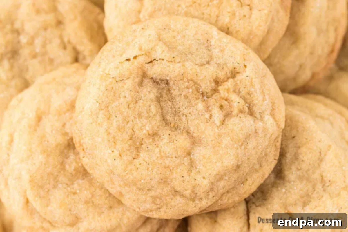 A stack of perfectly baked brown sugar cookies, highlighting their soft texture and golden-brown edges.