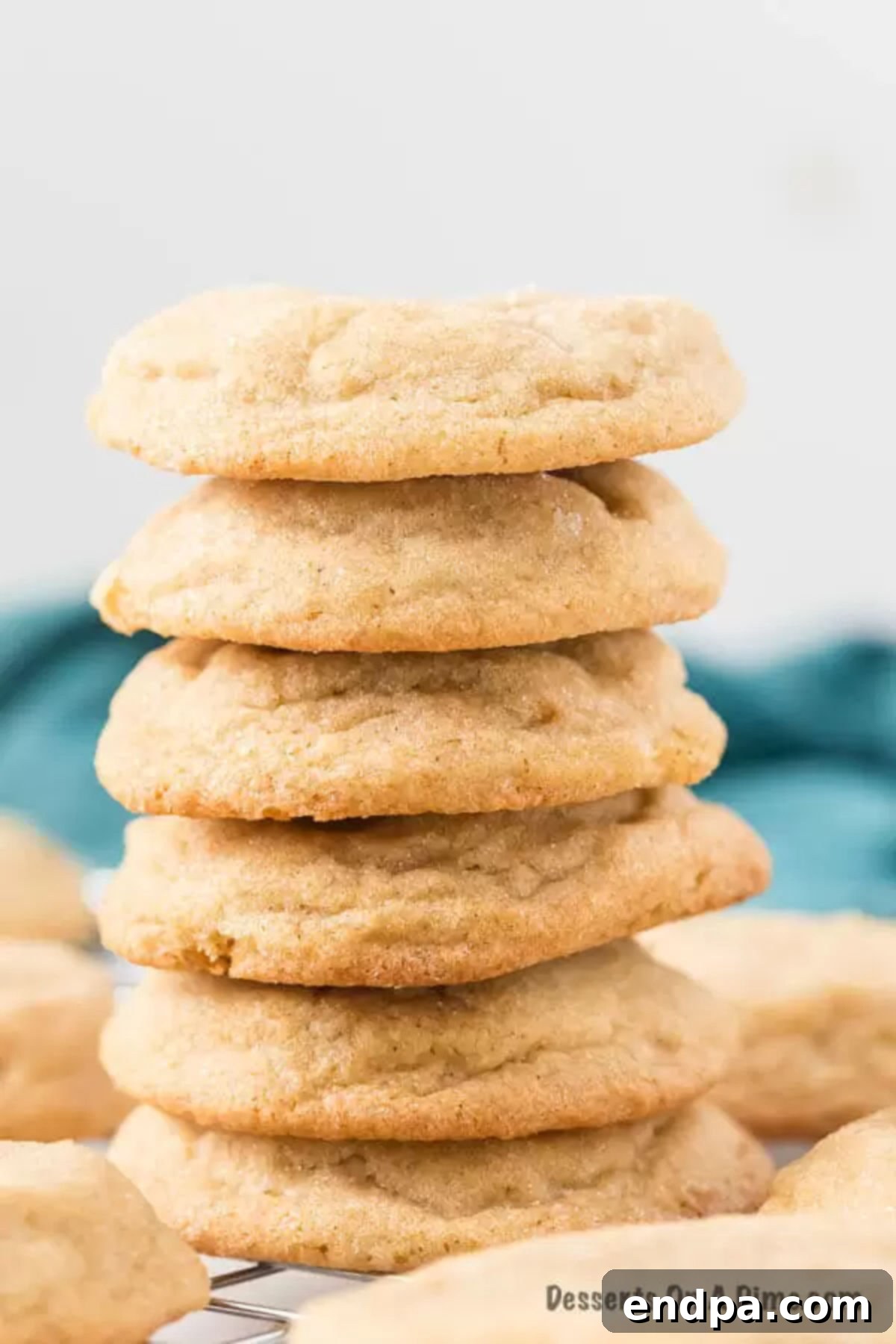 An inviting stack of homemade brown sugar cookies, showcasing their golden edges and soft centers, perfect for sharing.