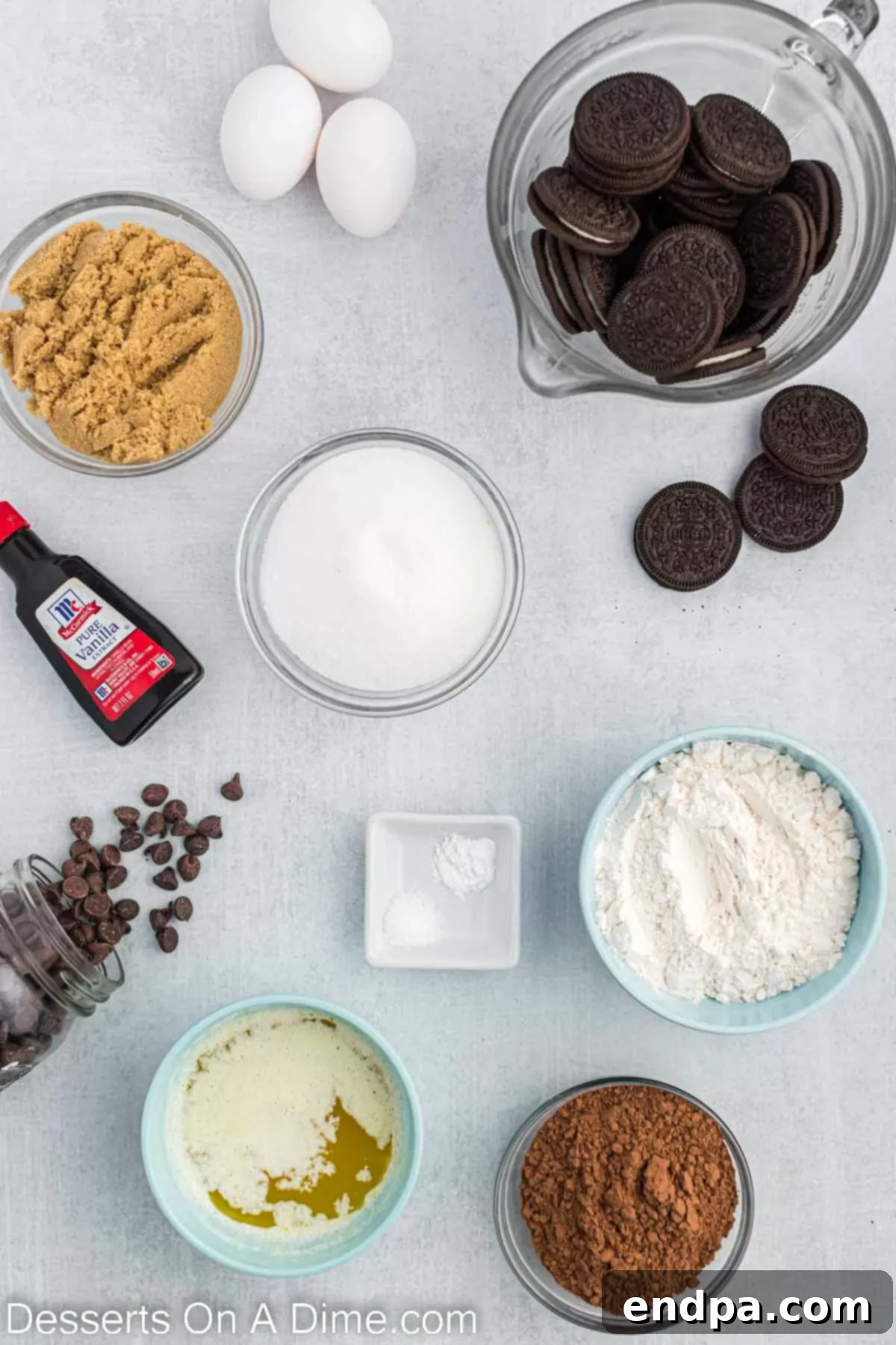Ingredients needed: granulated sugar, brown sugar, unsweetened cocoa powder, all-purpose flour, salt, baking powder, eggs, butter, vanilla extract, semi-sweet chocolate chips, and Oreo cookies.