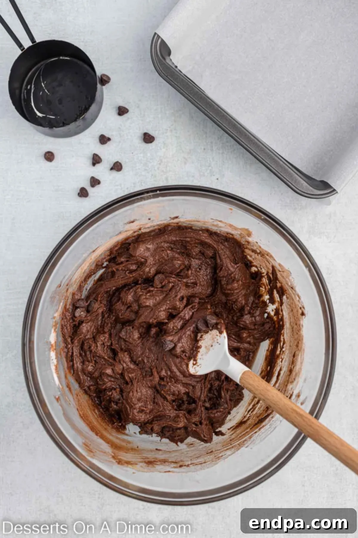Dry ingredients (cocoa powder, flour, salt, baking powder) added to the butter and sugar mixture.