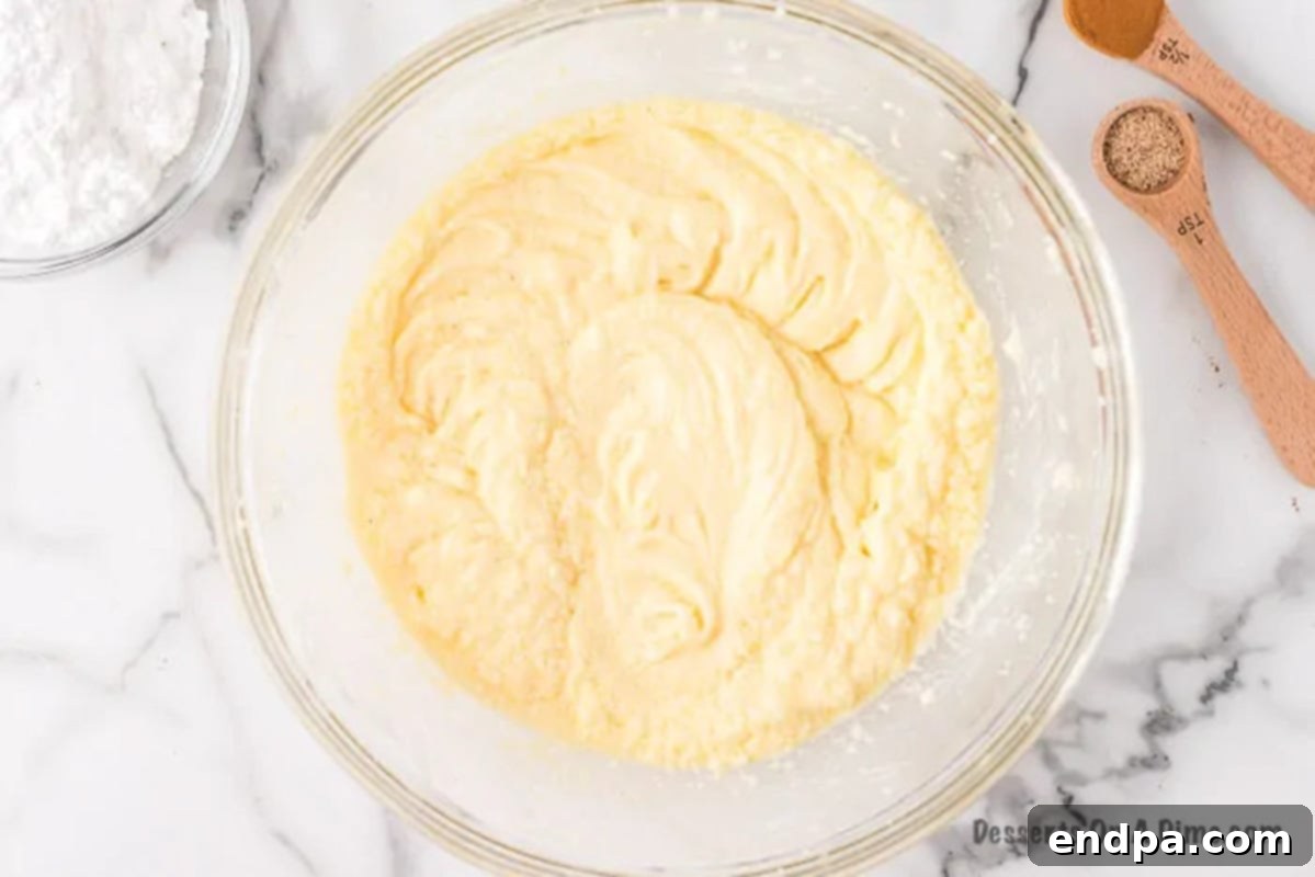 The eggnog mixture being blended until just combined.