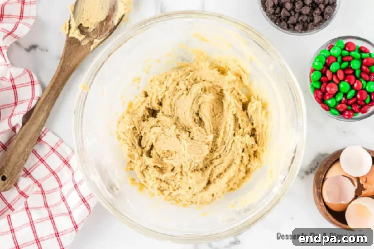 Deliciously Simple Santa Cookies 2 Creaming butter and sugars together in a bowl until light and fluffy for Santa cookies