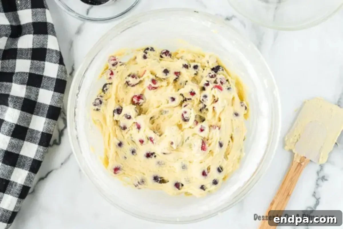 Fresh cranberries folded into the cake batter.