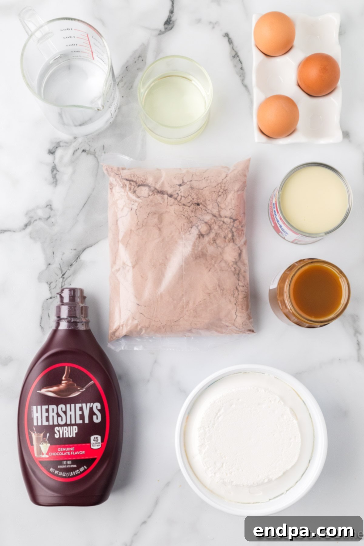 Gooey Chocolate Caramel Poke Cake 3 Ingredients for recipe - cake mix, eggs, oil, sweetened condensed milk, chocolate syrup, cool whip.