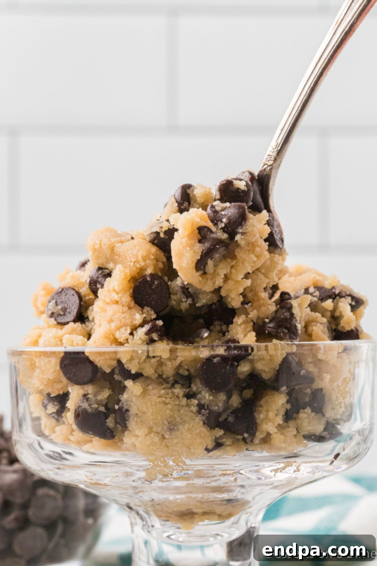 Keto Cookie Dough Bliss 2 A bowl of delectable Keto Edible Cookie Dough, ready to be enjoyed as a guilt-free, low-carb treat.