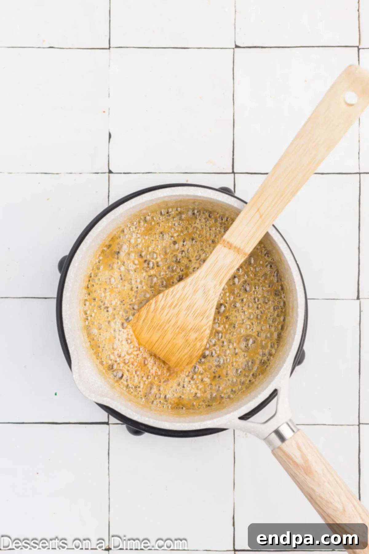 Brown sugar and butter mixture in a saucepan.