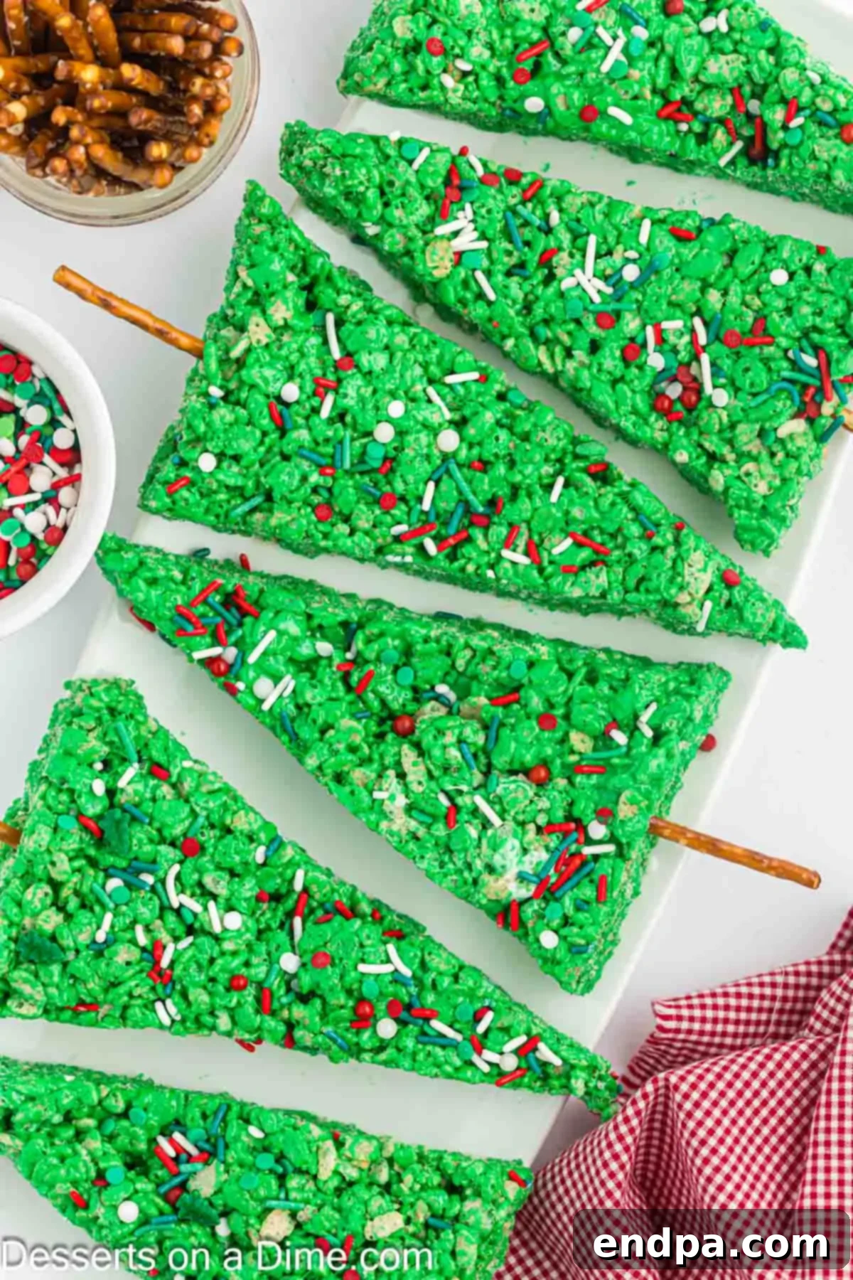Festive Christmas Tree Rice Krispie Treats arranged beautifully on a serving platter, ready for holiday celebrations.
