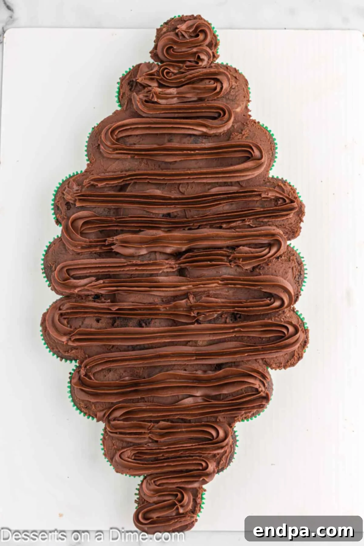 Frosting swirled on cake. 