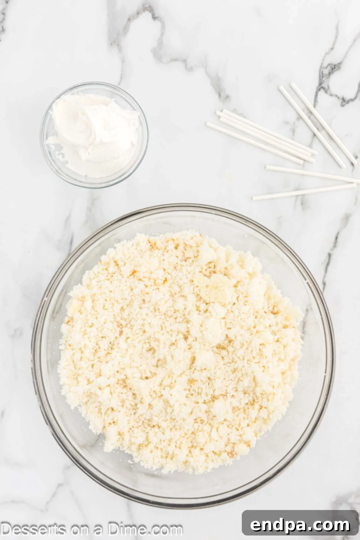 Cake crumbled in bowl. 