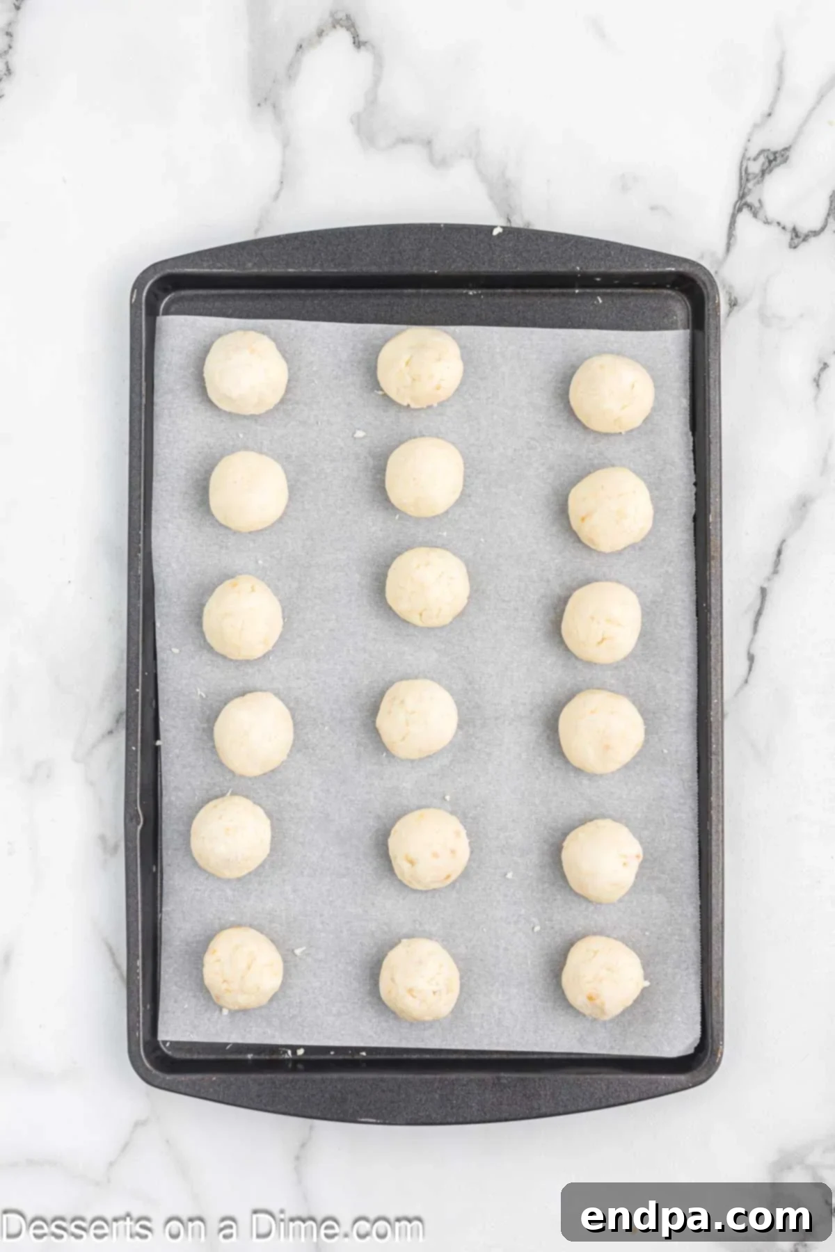Cake balls on baking sheet. 