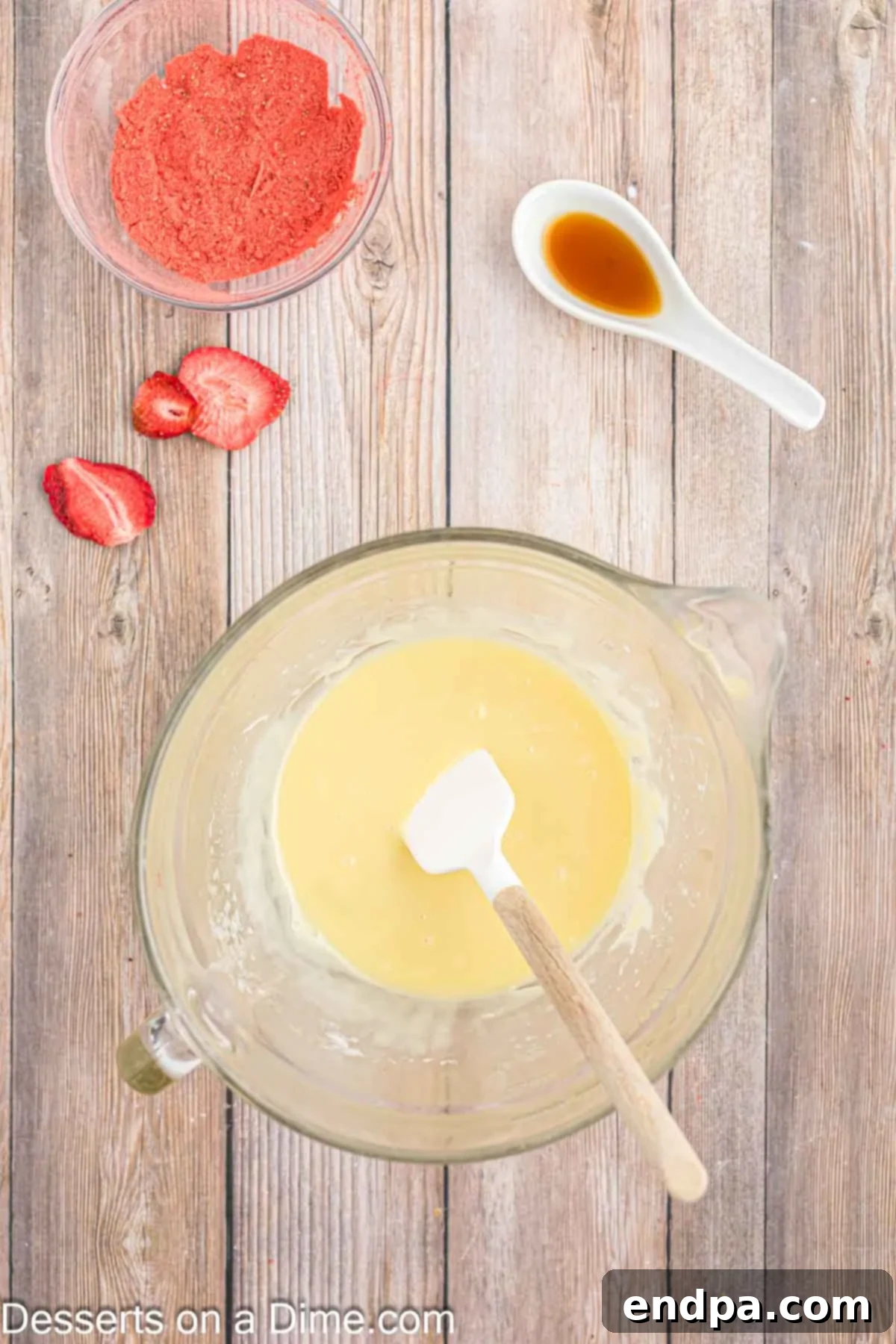 Heavy cream, butter, and white chocolate melting together in a microwave-safe bowl.