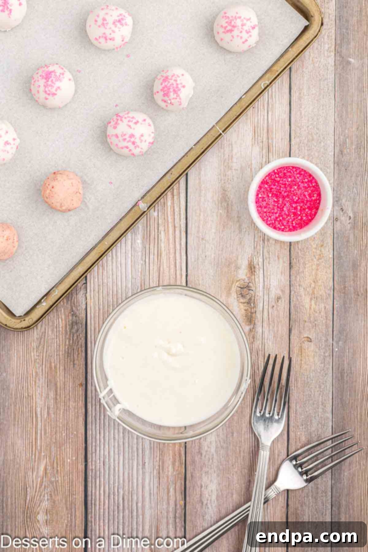 Melted white chocolate in a small bowl, prepared for dipping.