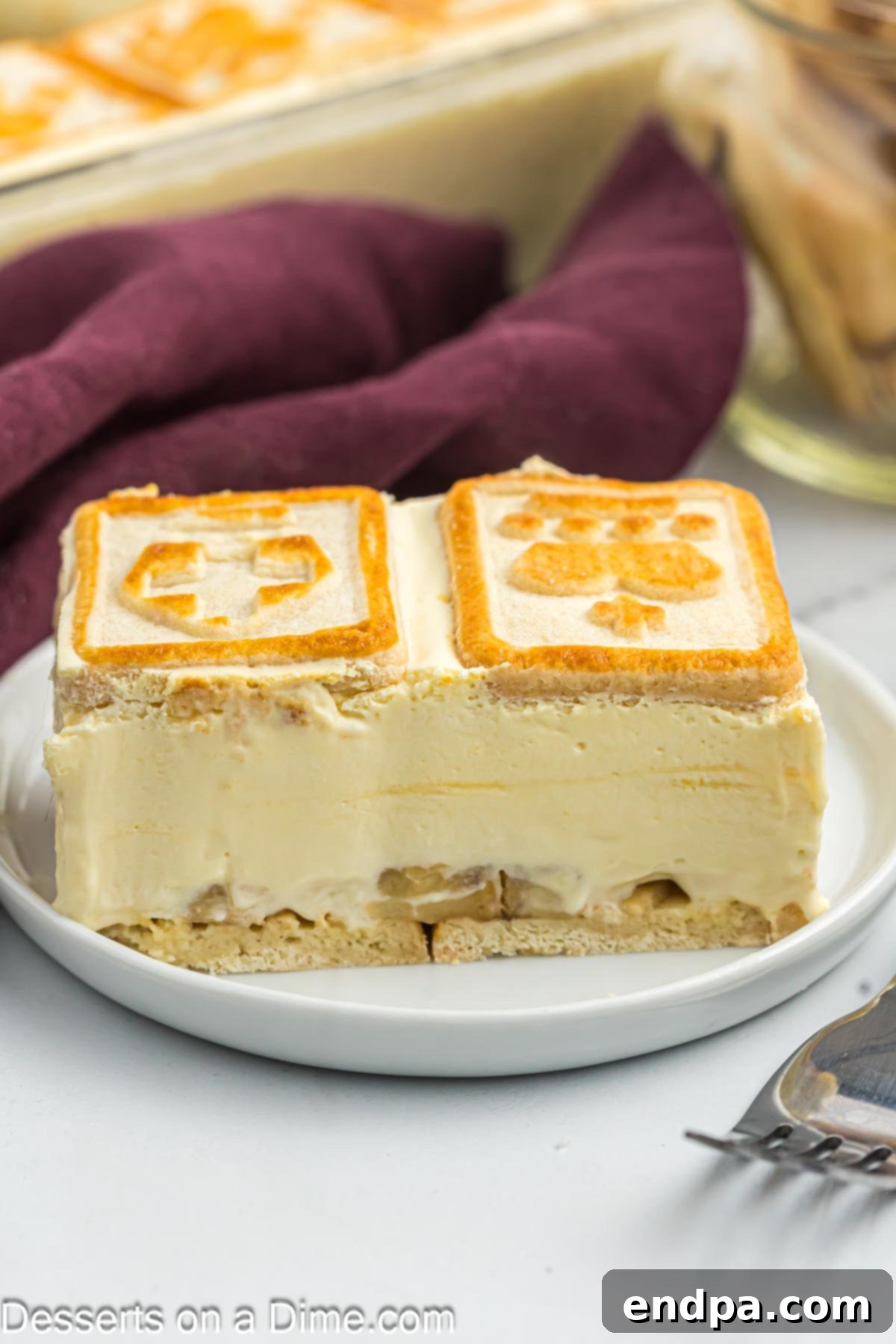 Paula Deen's Southern Banana Pudding 2 Serving of banana pudding on plate.