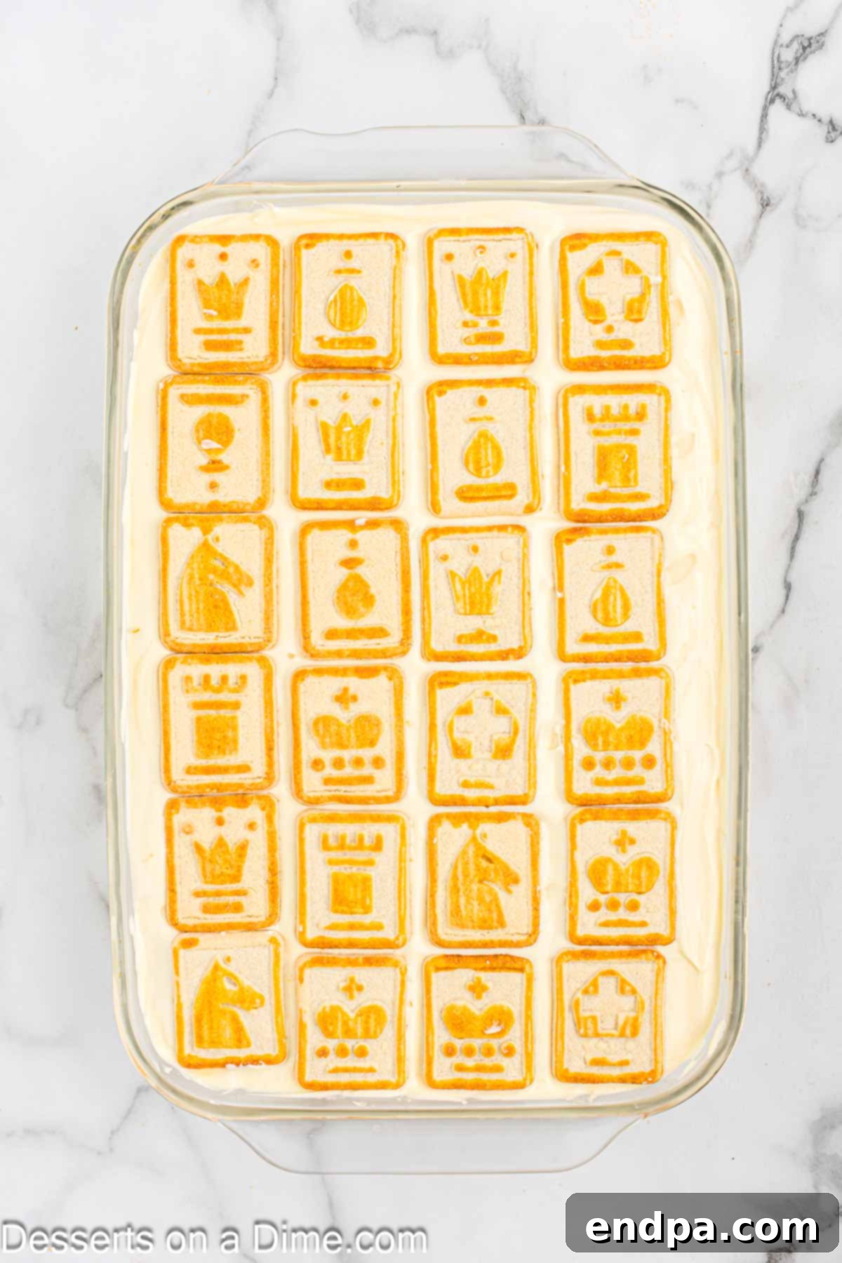 Paula Deen's Southern Banana Pudding 11 Layer of cookies on top of mixture.