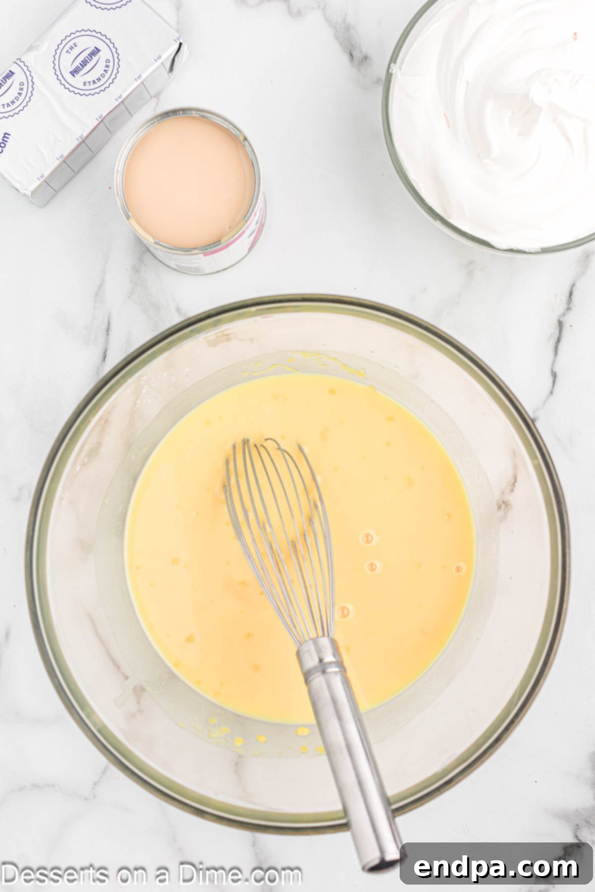 Paula Deen's Southern Banana Pudding 6 Pudding and milk combined in bowl.