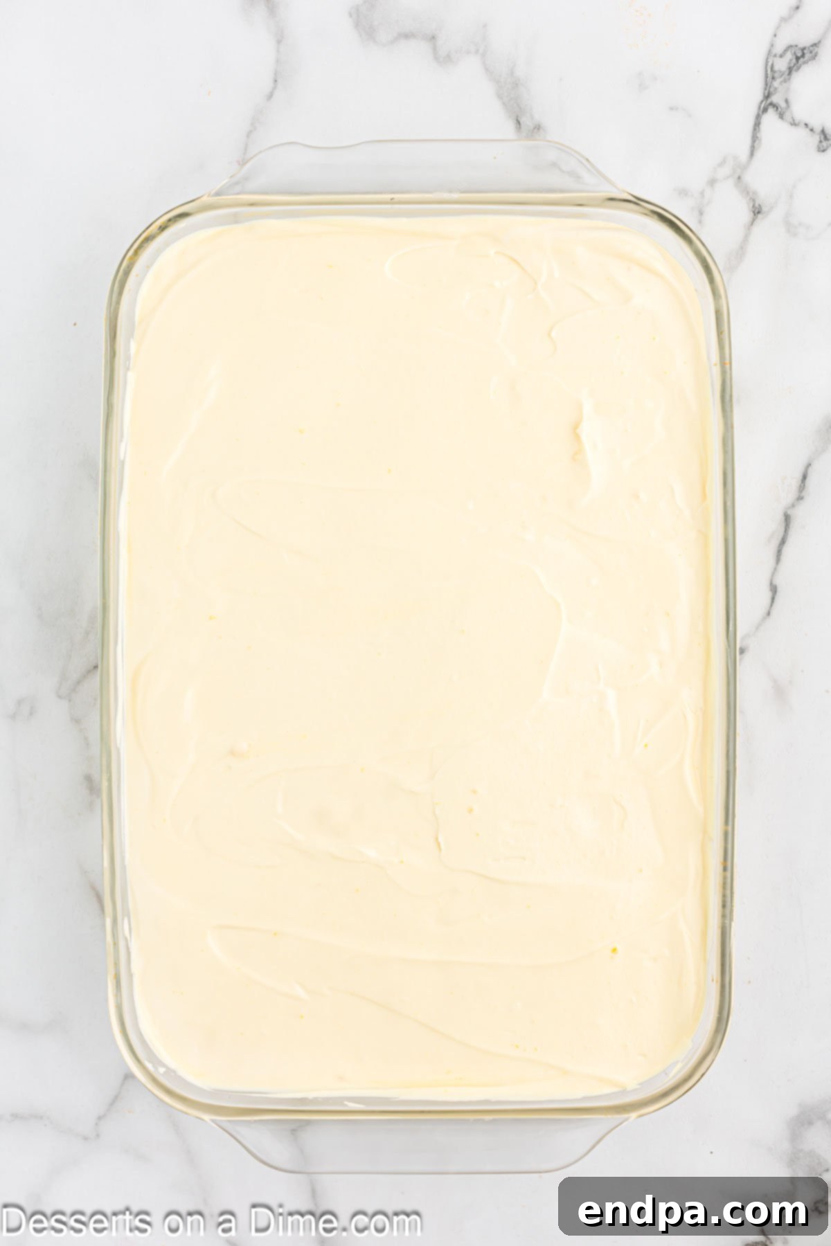 Paula Deen's Southern Banana Pudding 10 Mixture spread over top of dish.