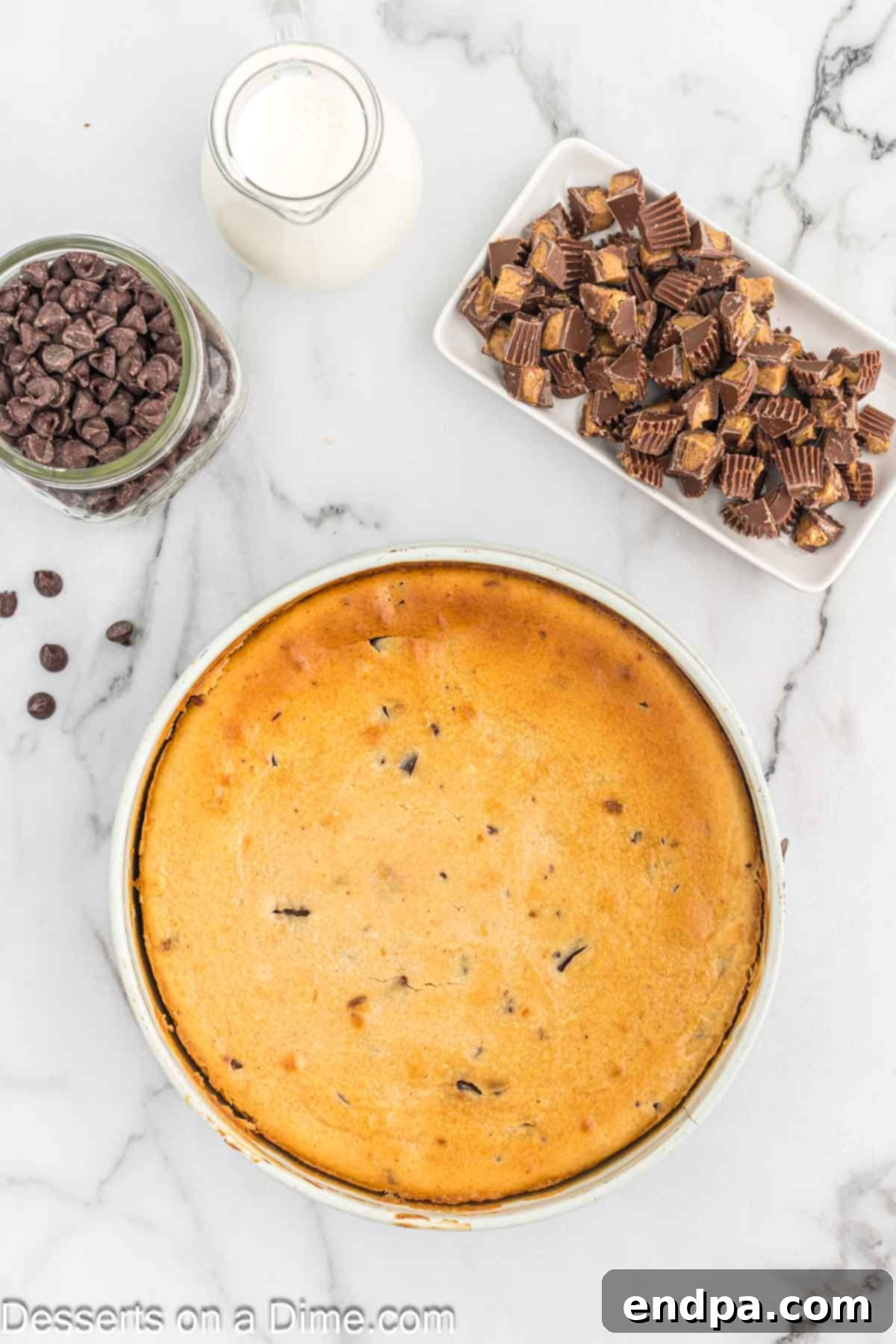 Cheesecake baked and cooling in pan. 