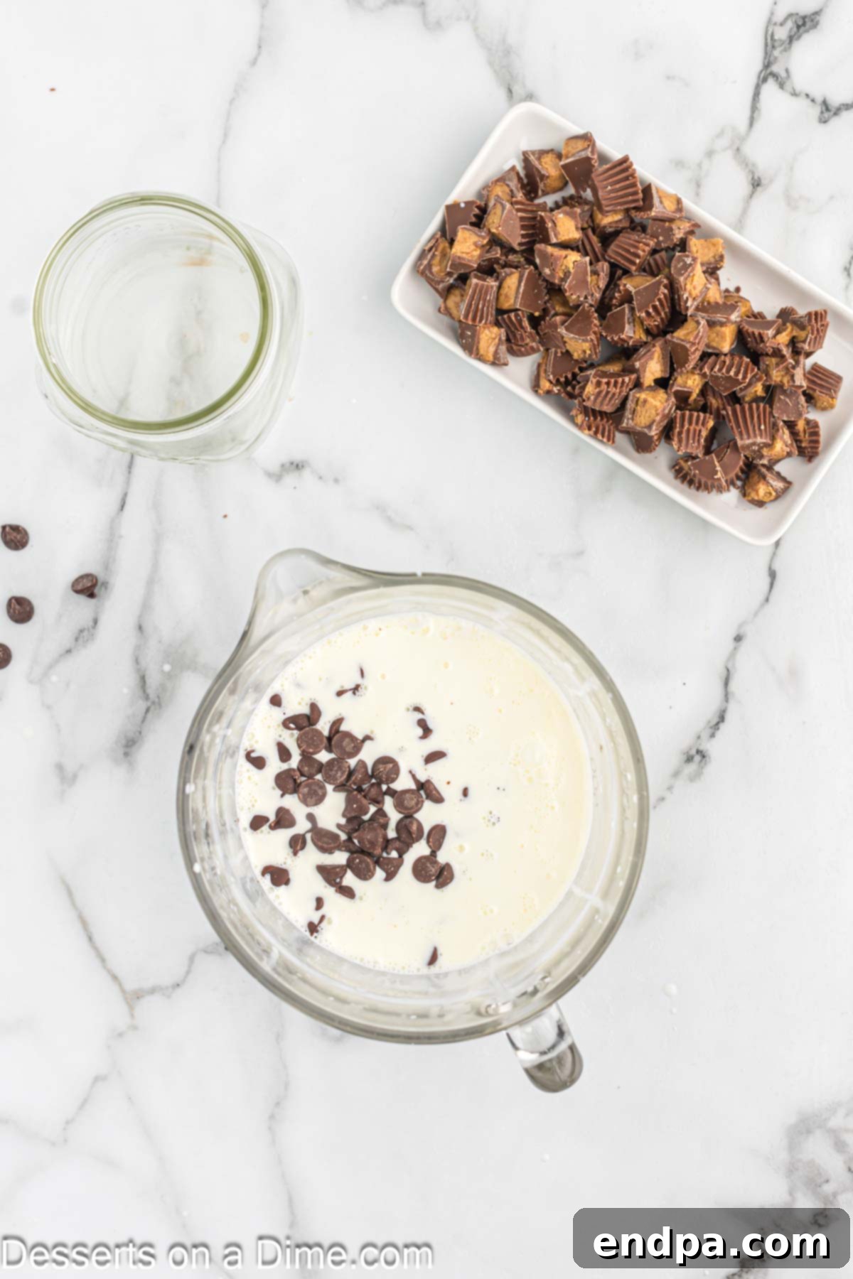 Bowl with chocolate and heavy cream. 